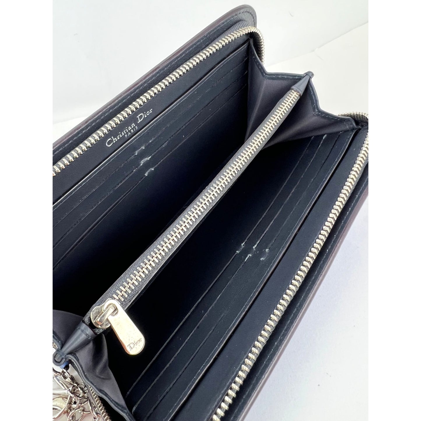
                  
                    Christian Dior Lady Dior Metallic Blue Grained Leather Zip Around Wallet
                  
                