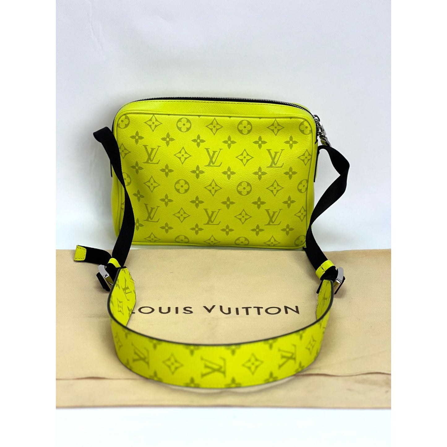 Shop authentic Louis Vuitton Taigarama Outdoor Messenger at