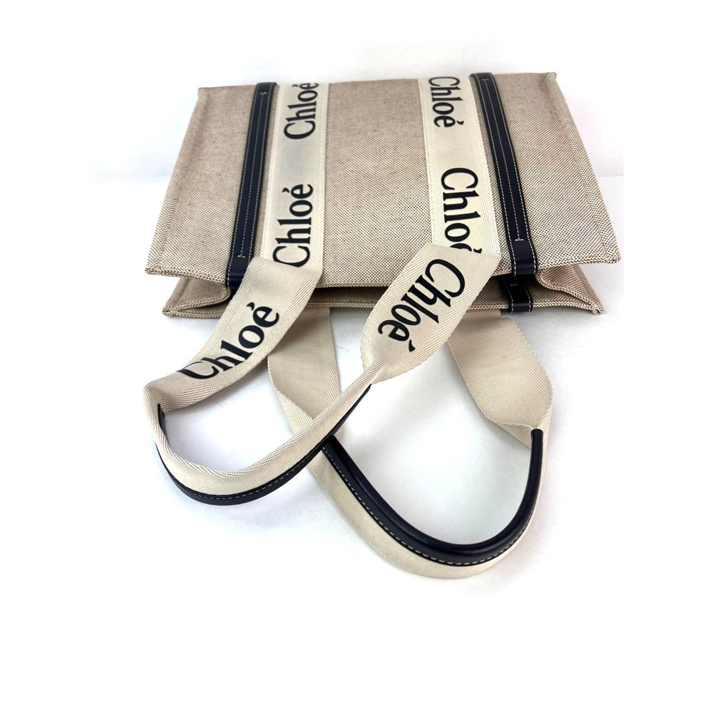 
                  
                    Chloe Woody Ribbon Medium Cotton Calfskin Beige Tote Bag
                  
                