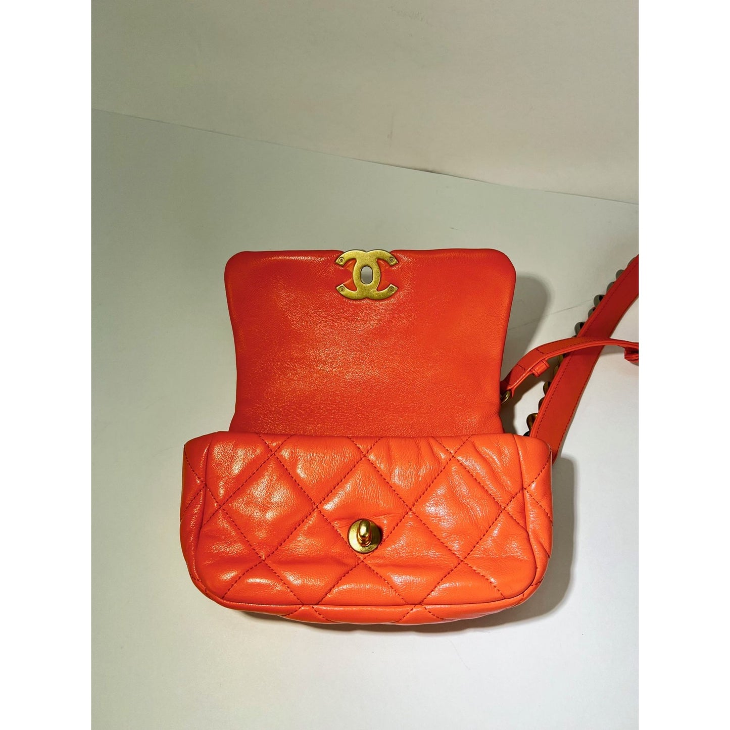 
                  
                    Chanel Goatskin Quilted Chanel 19 Waist Belt Bag Orange
                  
                