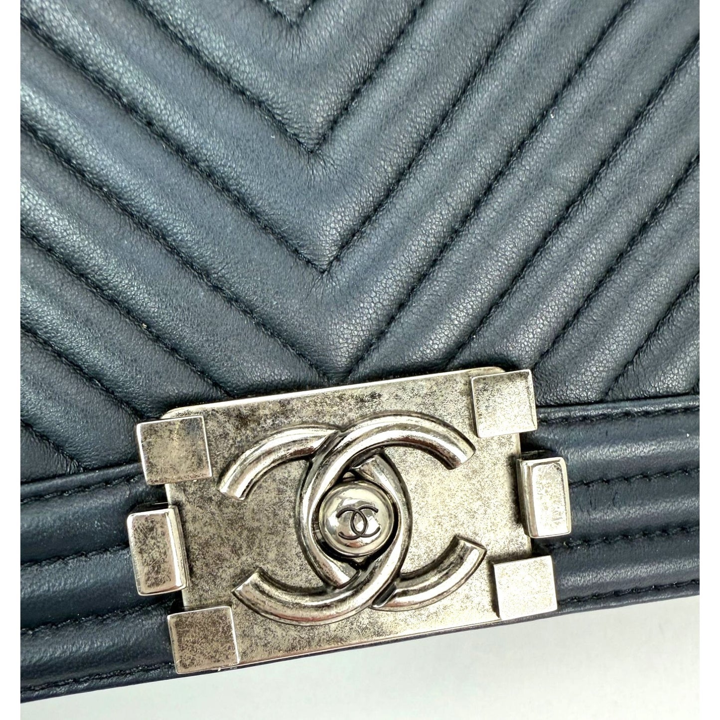 
                  
                    CHANEL Lambskin Chevron Quilted Medium Boy Flap Navy Blue Shoulder Bag
                  
                