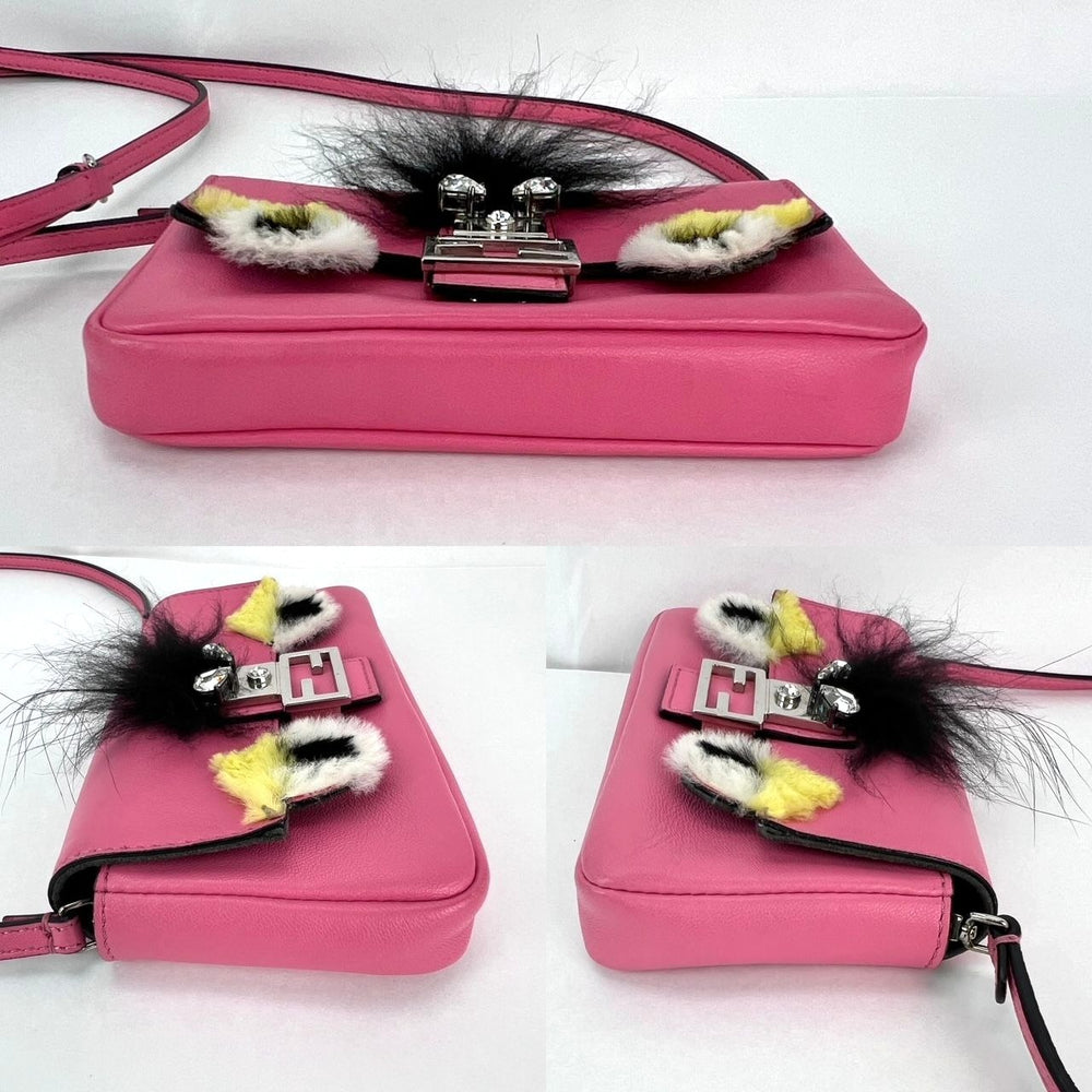 
                  
                    Fendi Monster Baguette Pink Leather Micro Crossbody Bag
                  
                