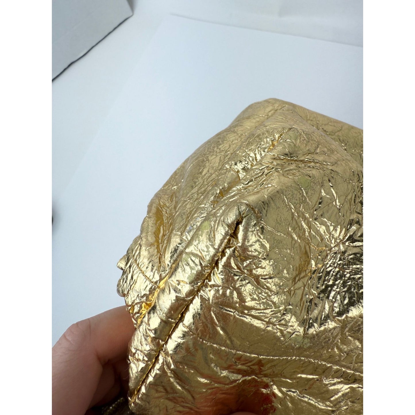 
                  
                    Bottega Veneta Metallic Gold Crinkled Lambskin The Pouch Oversized Clutch Bag
                  
                