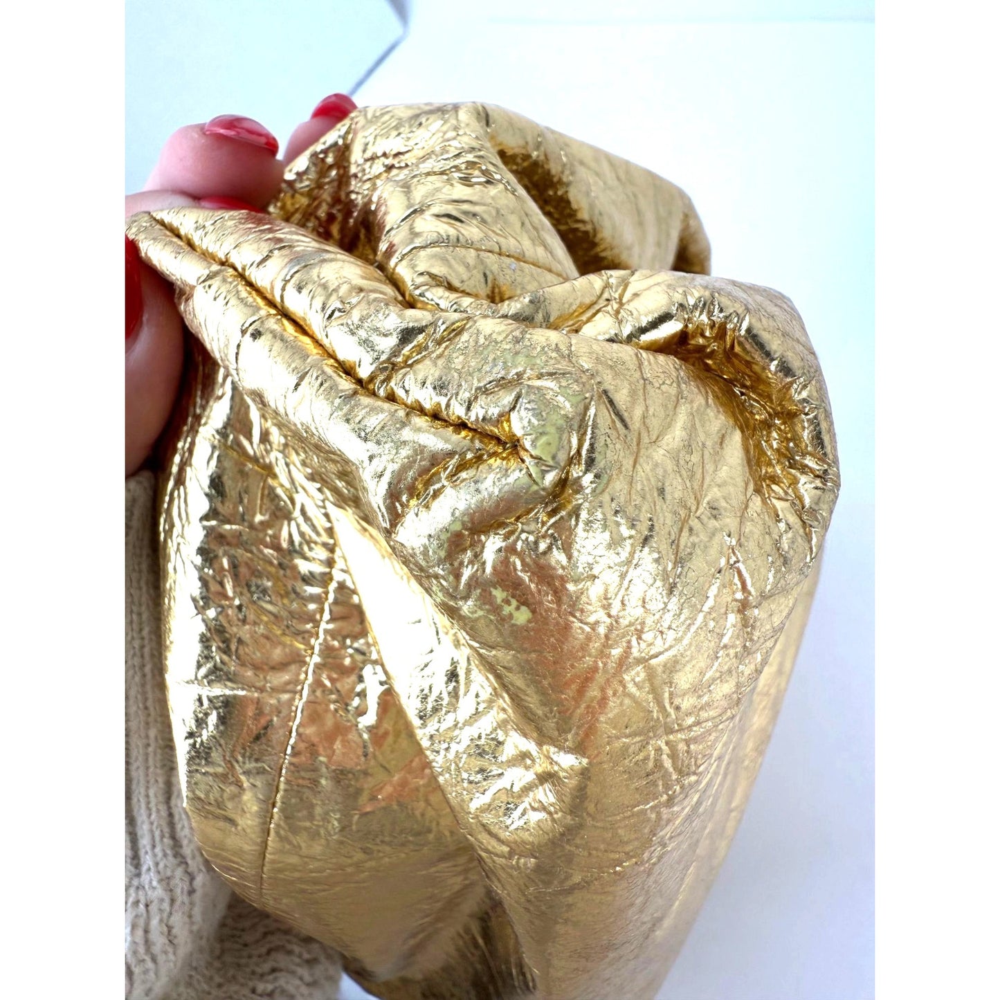 
                  
                    Bottega Veneta Metallic Gold Crinkled Lambskin The Pouch Oversized Clutch Bag
                  
                