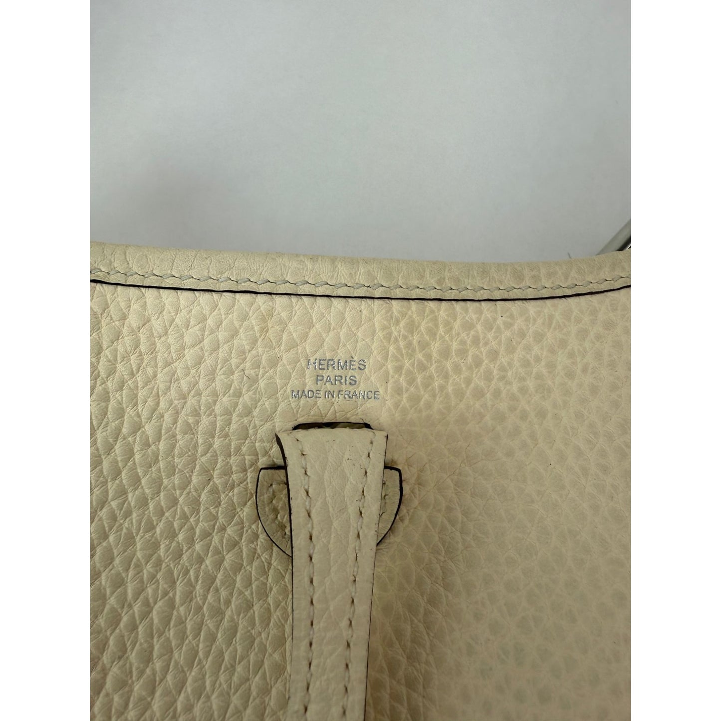 
                  
                    Hermes Taurillon Clemence evelyne TPM Nata White Crossbody Bag
                  
                