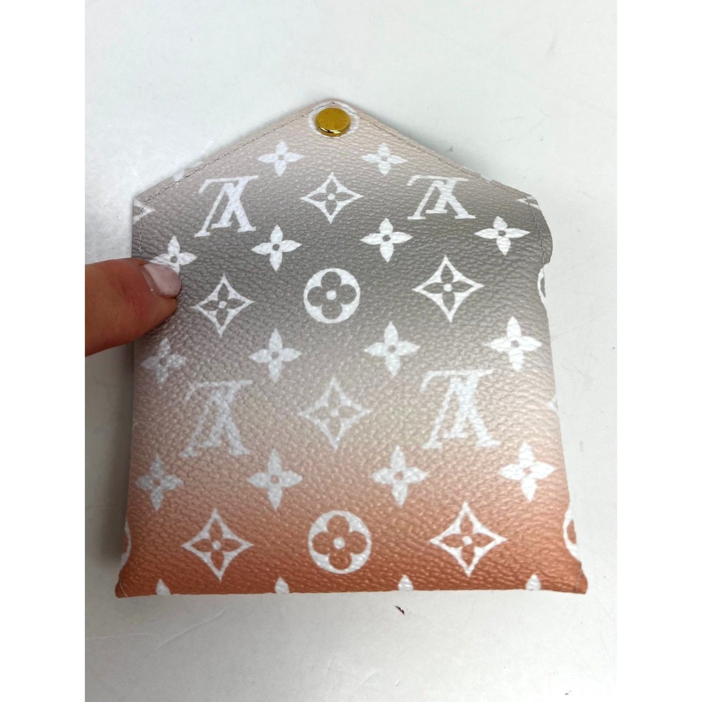 
                  
                    LOUIS VUITTON Kirigami Pochette Small Pool Giant Monogram Card Case
                  
                