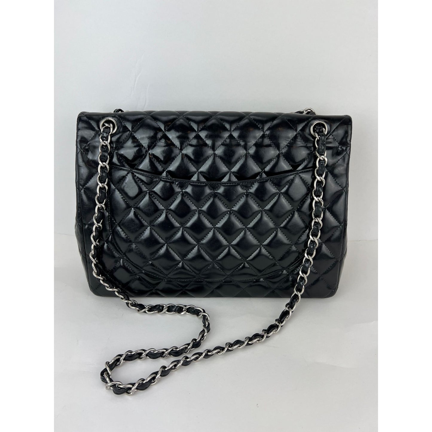 
                  
                    Chanel Double Flap Black Patent Leather Maxi Shoulder Bag
                  
                