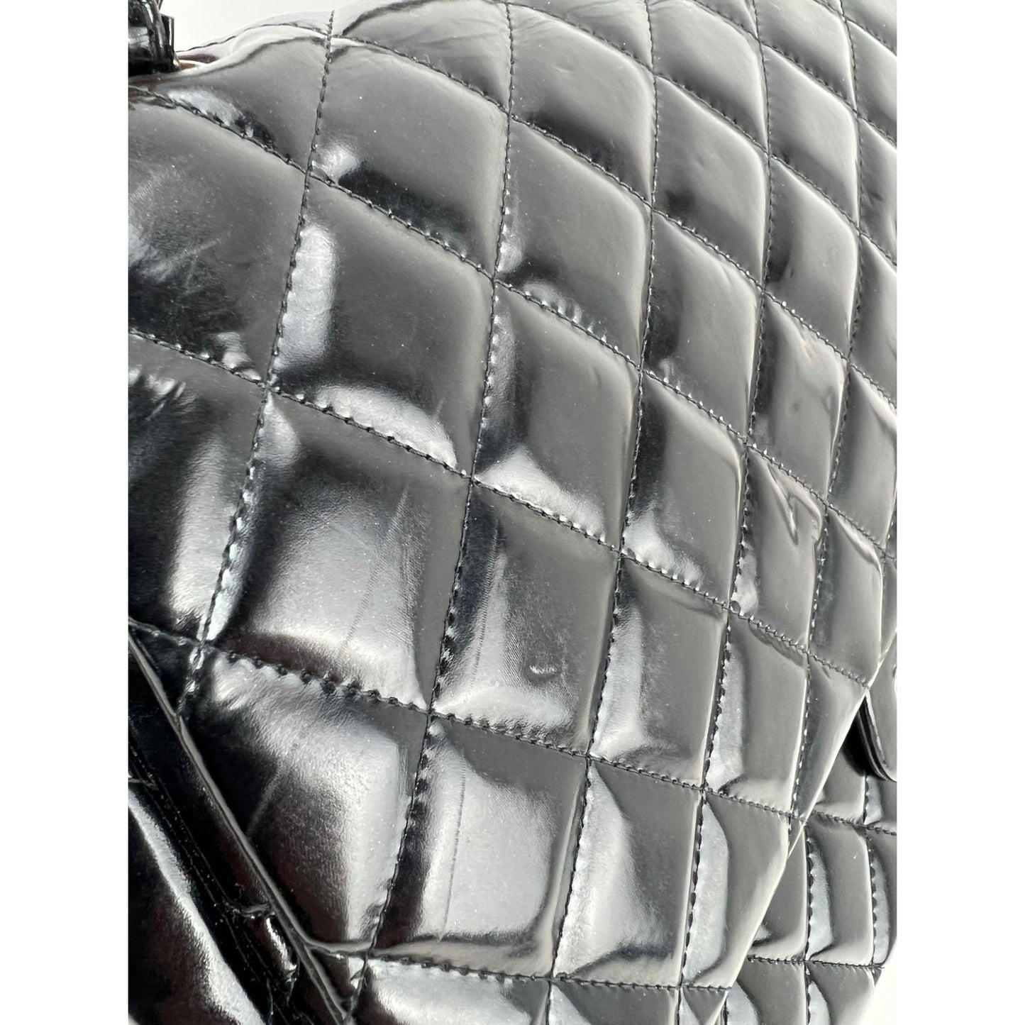 
                  
                    Chanel Double Flap Black Patent Leather Maxi Shoulder Bag
                  
                