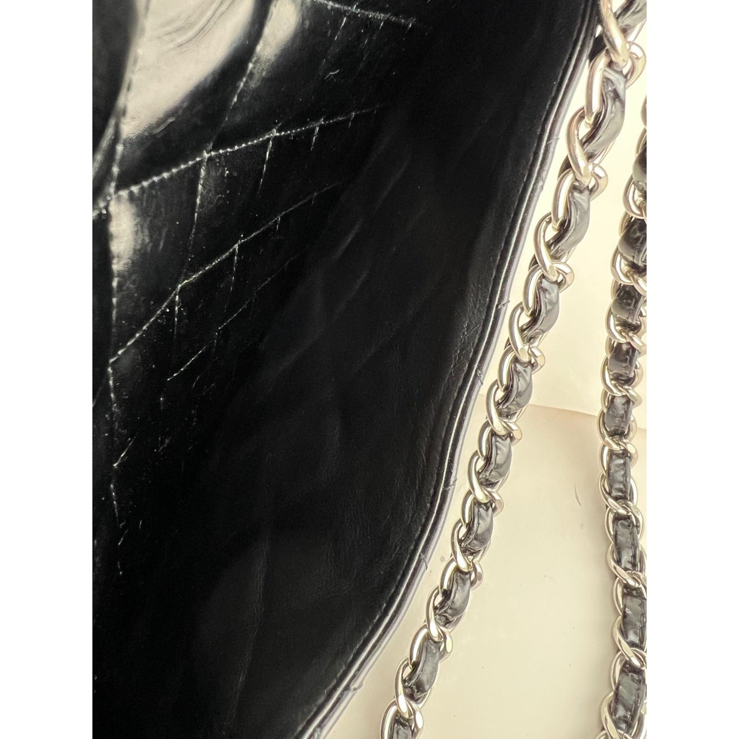 
                  
                    Chanel Double Flap Black Patent Leather Maxi Shoulder Bag
                  
                