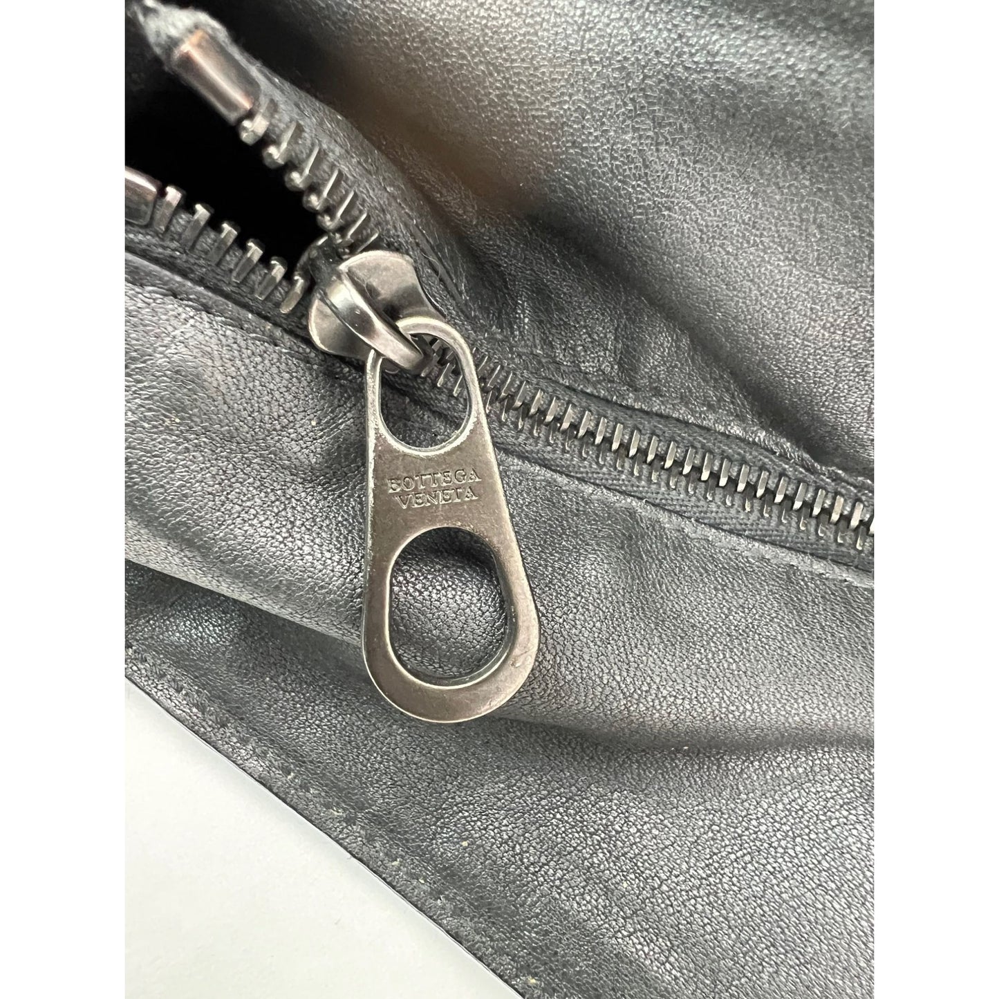 
                  
                    Bottega Veneta Intreciato Black leather zippered Messenger Tote Bag
                  
                
