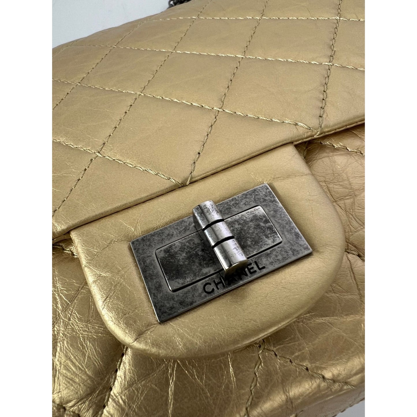 
                  
                    Chanel Metallic Aged Calfskin Quilted 2.55 Reissue 227 Double Flap Pale Gold
                  
                
