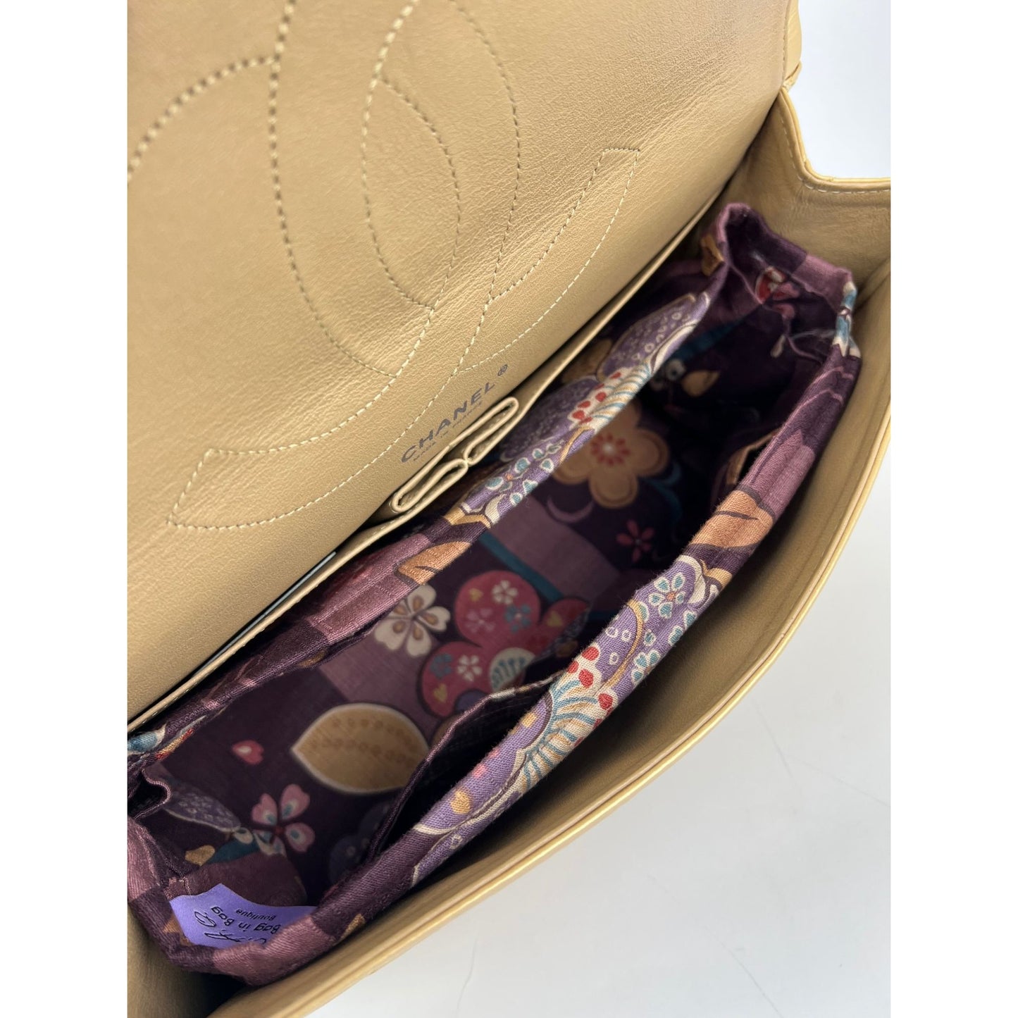 
                  
                    Chanel Metallic Aged Calfskin Quilted 2.55 Reissue 227 Double Flap Pale Gold
                  
                