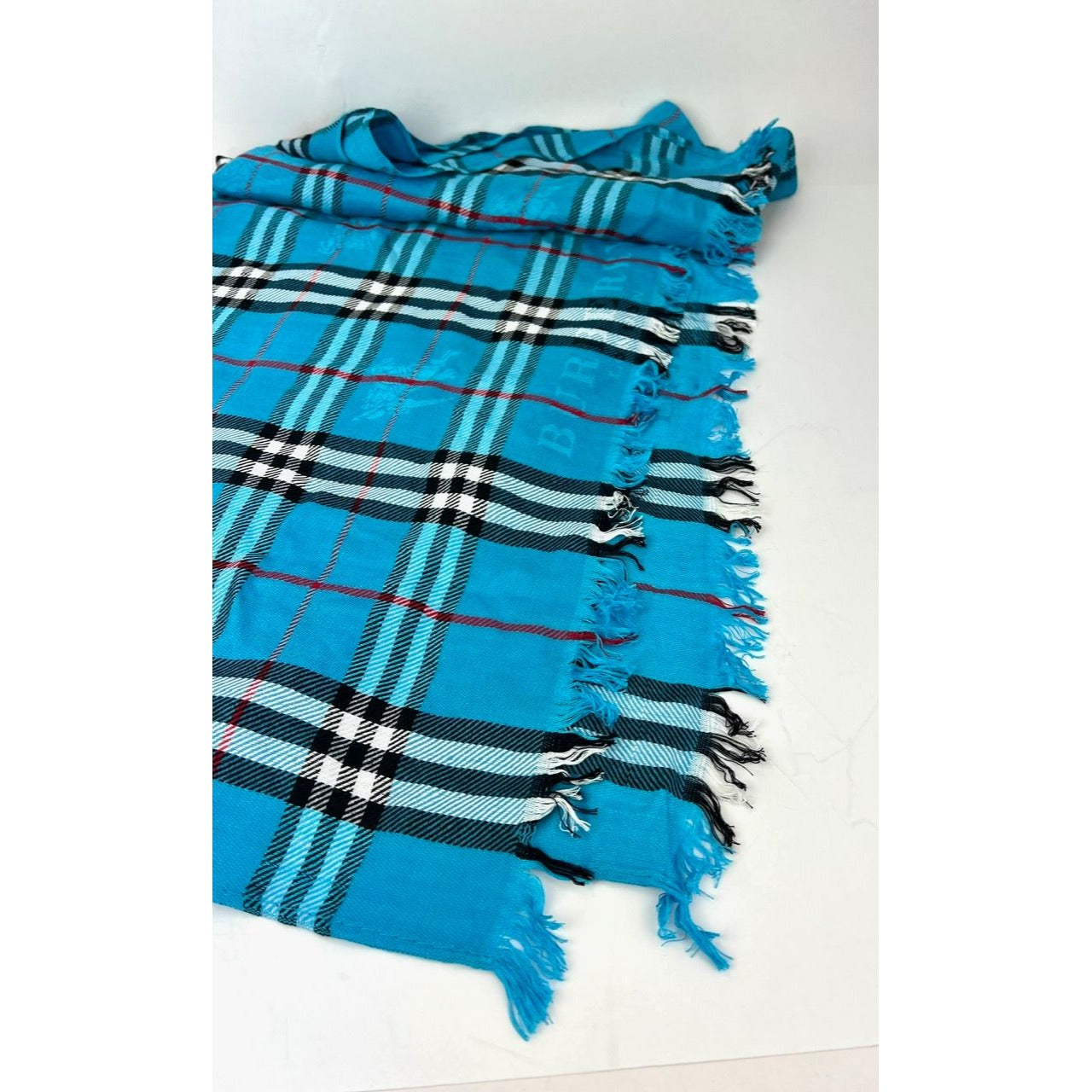 
                  
                    Burberry Check Pattern Wool Silk Blue Scarf
                  
                