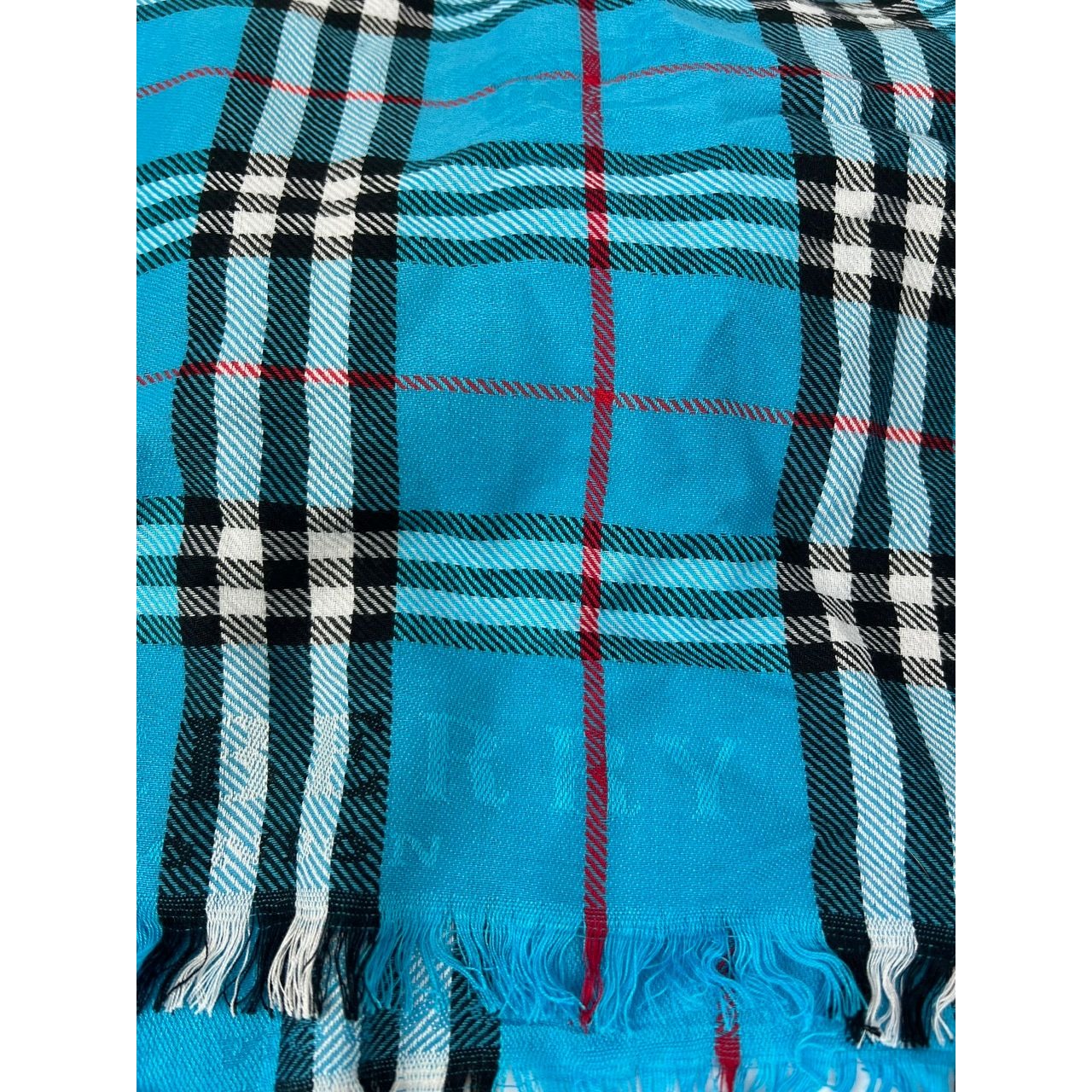 
                  
                    Burberry Check Pattern Wool Silk Blue Scarf
                  
                
