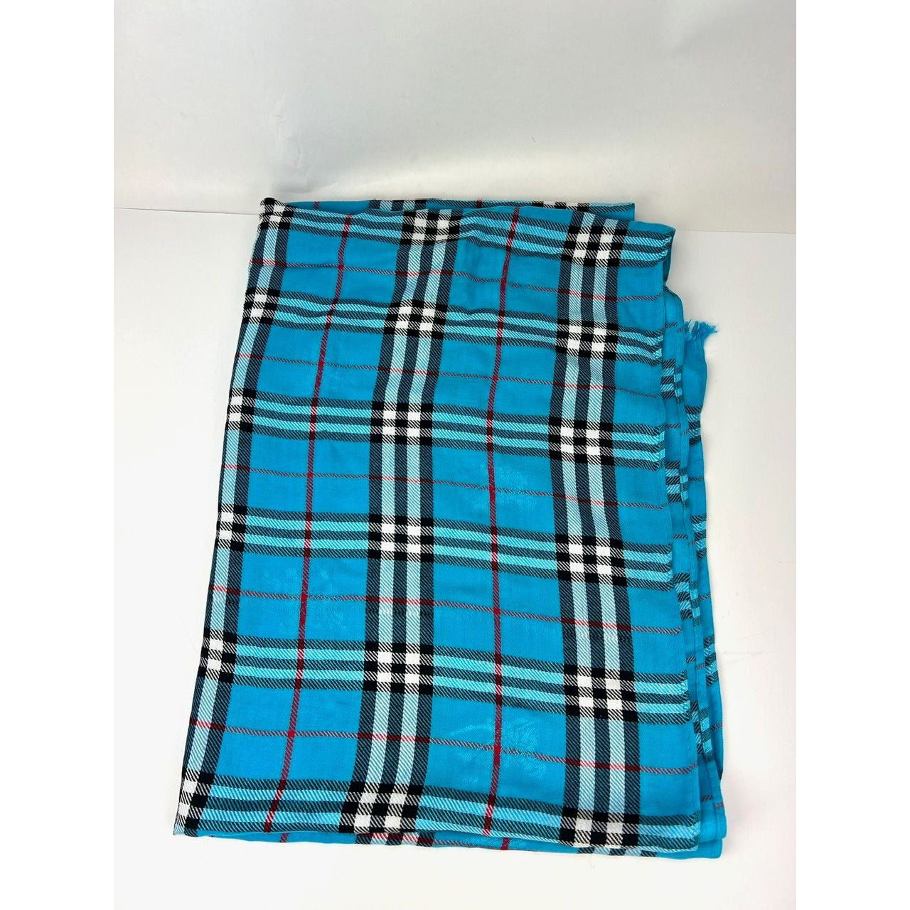 
                  
                    Burberry Check Pattern Wool Silk Blue Scarf
                  
                
