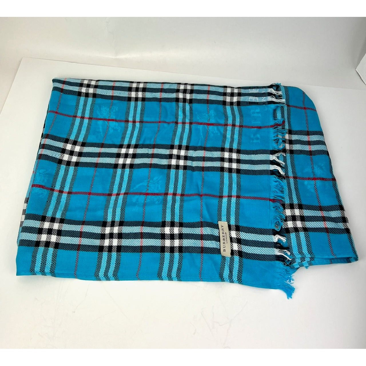
                  
                    Burberry Check Pattern Wool Silk Blue Scarf
                  
                