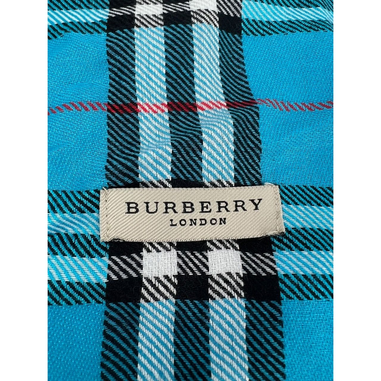 
                  
                    Burberry Check Pattern Wool Silk Blue Scarf
                  
                