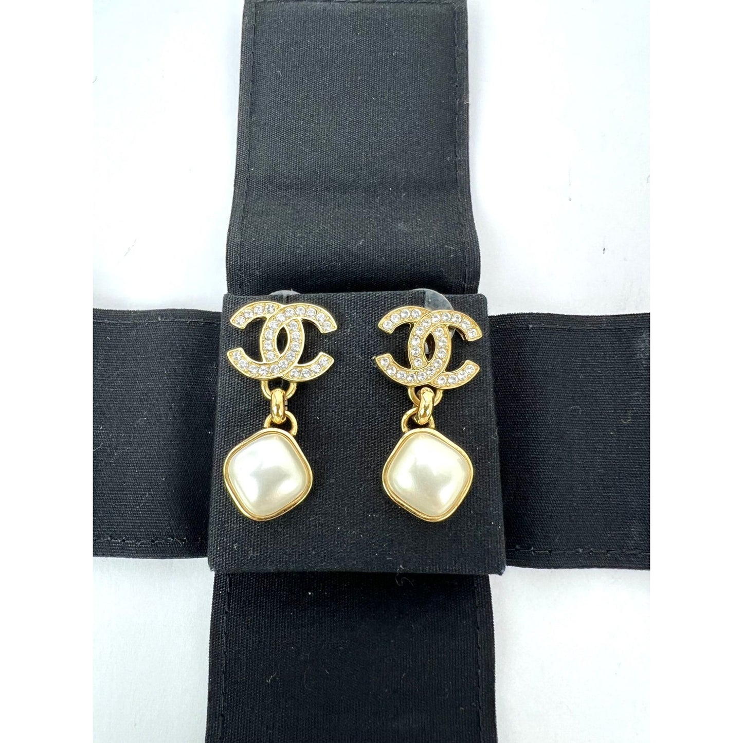 
                  
                    Chanel Gold Crystal CC Pearl Dangle Earrings
                  
                