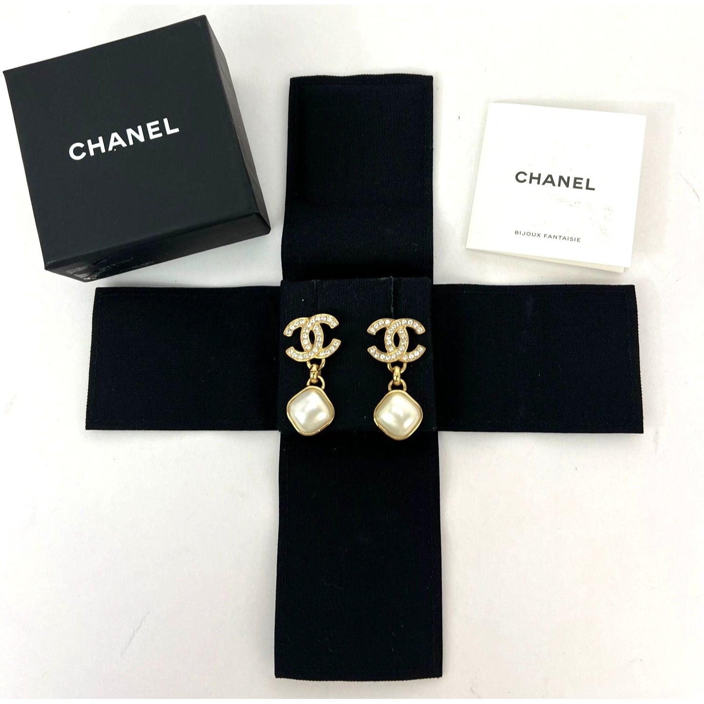 
                  
                    Chanel Gold Crystal CC Pearl Dangle Earrings
                  
                