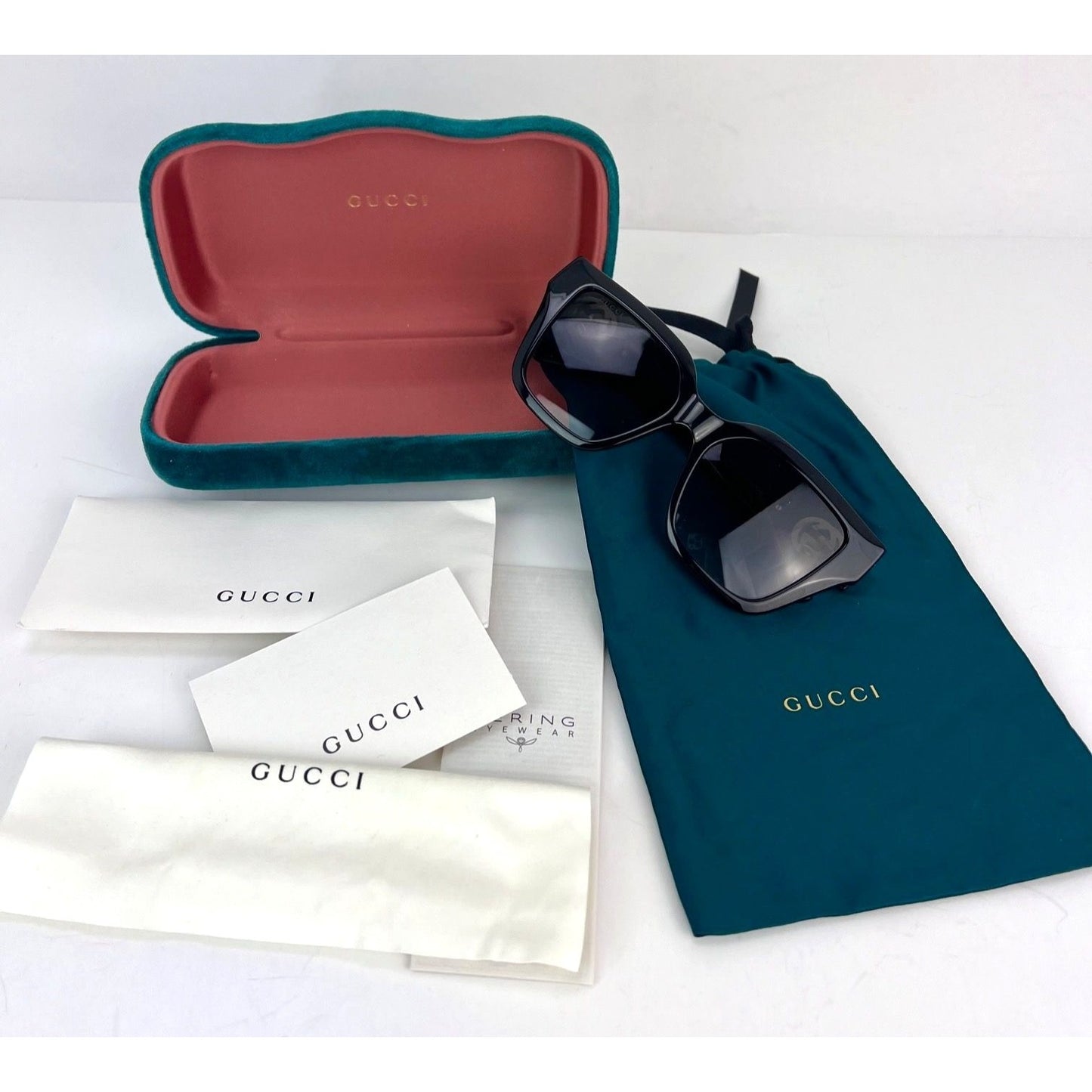 
                  
                    Gucci Black Retangle GG1023S Sunglasses
                  
                