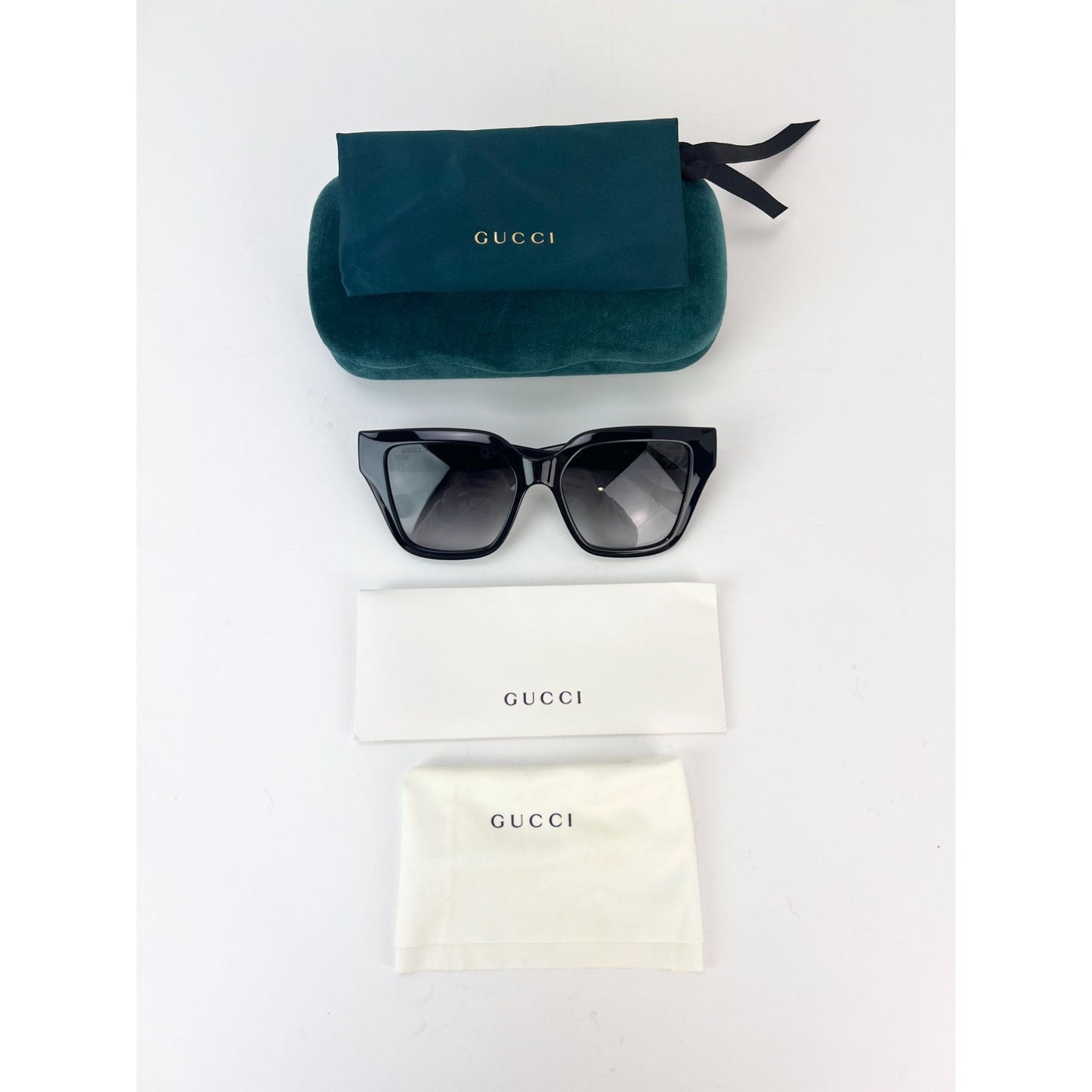 
                  
                    Gucci Black Retangle GG1023S Sunglasses
                  
                