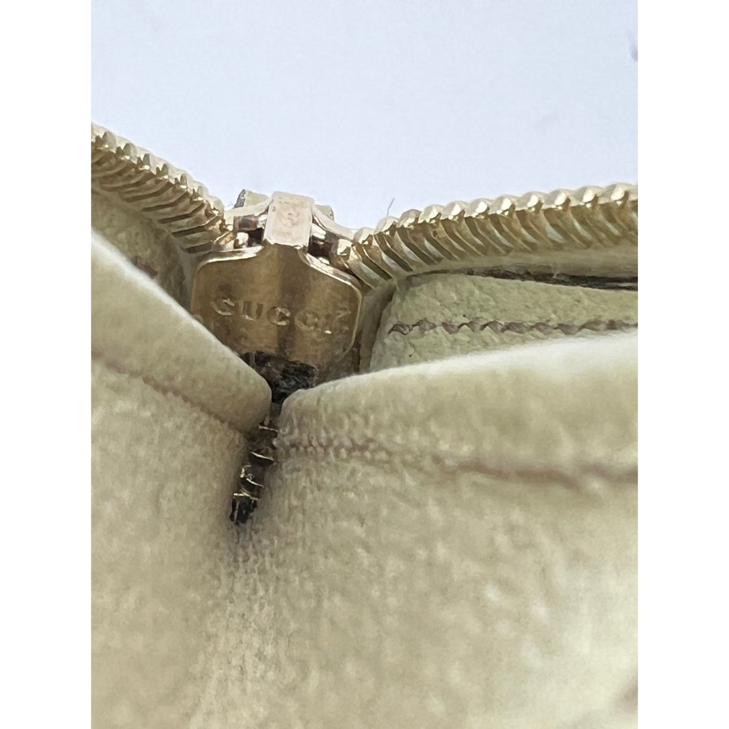 
                  
                    Gucci GG Logo Beige Zip Around Canvas Wallet
                  
                
