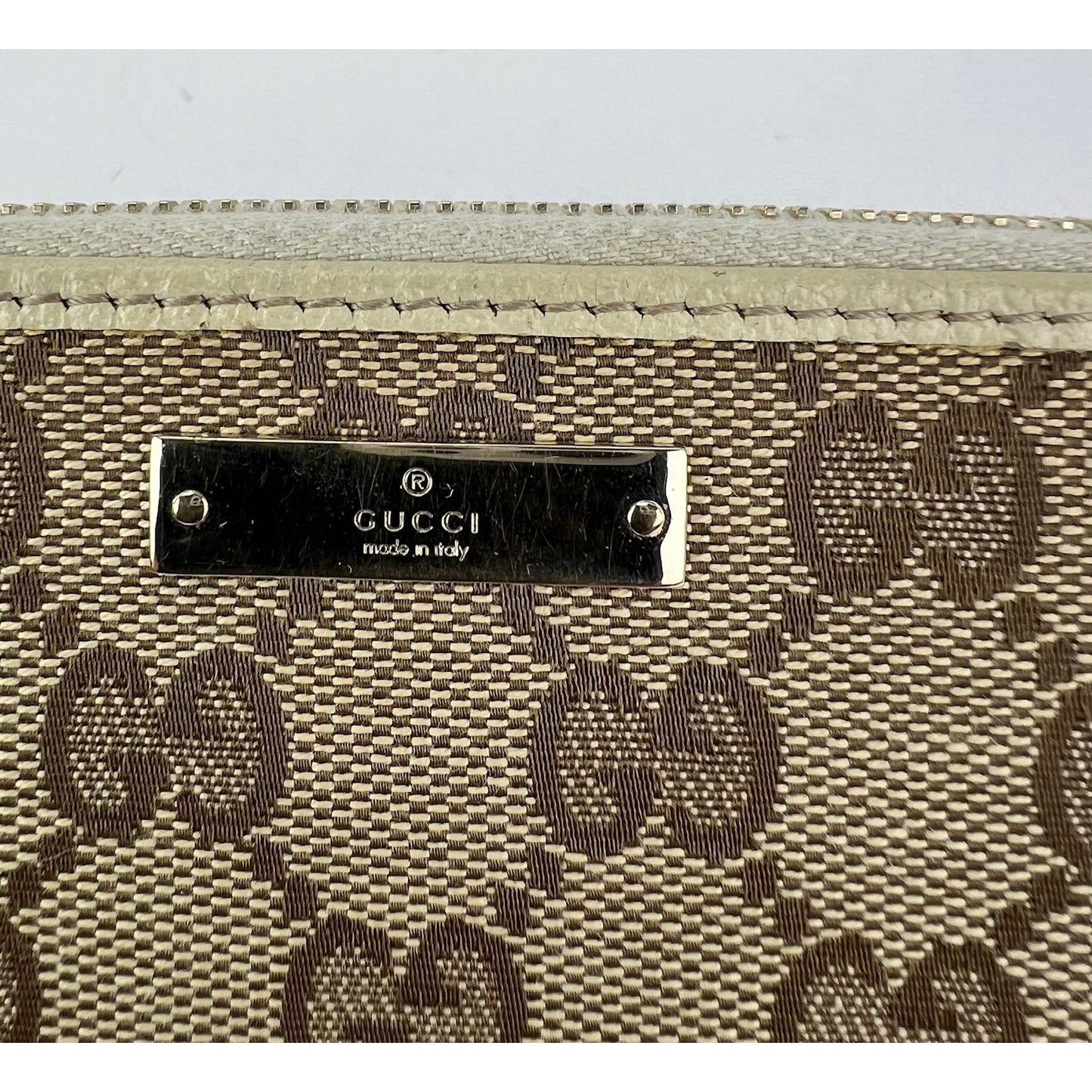 
                  
                    Gucci GG Logo Beige Zip Around Canvas Wallet
                  
                