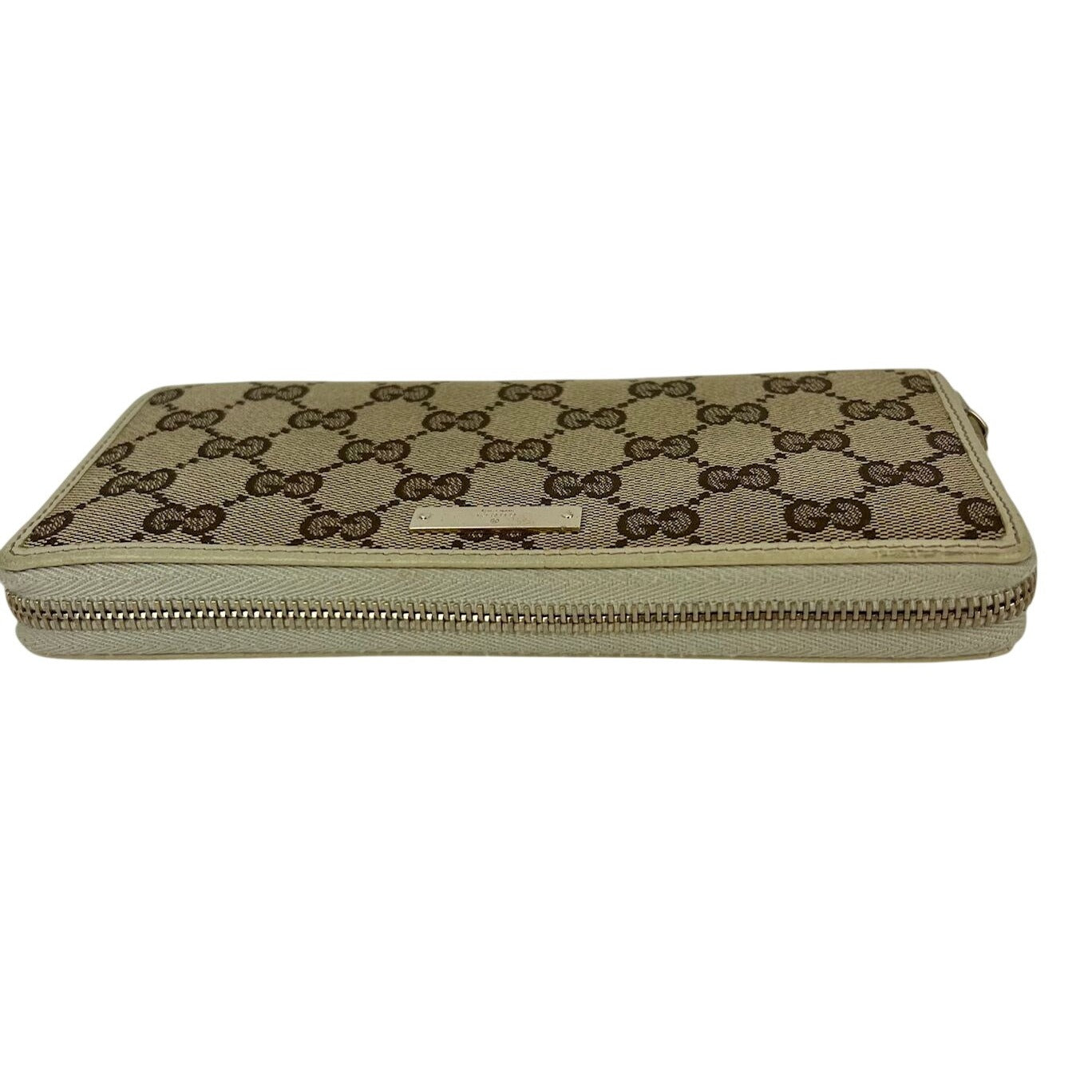 
                  
                    Gucci GG Logo Beige Zip Around Canvas Wallet
                  
                