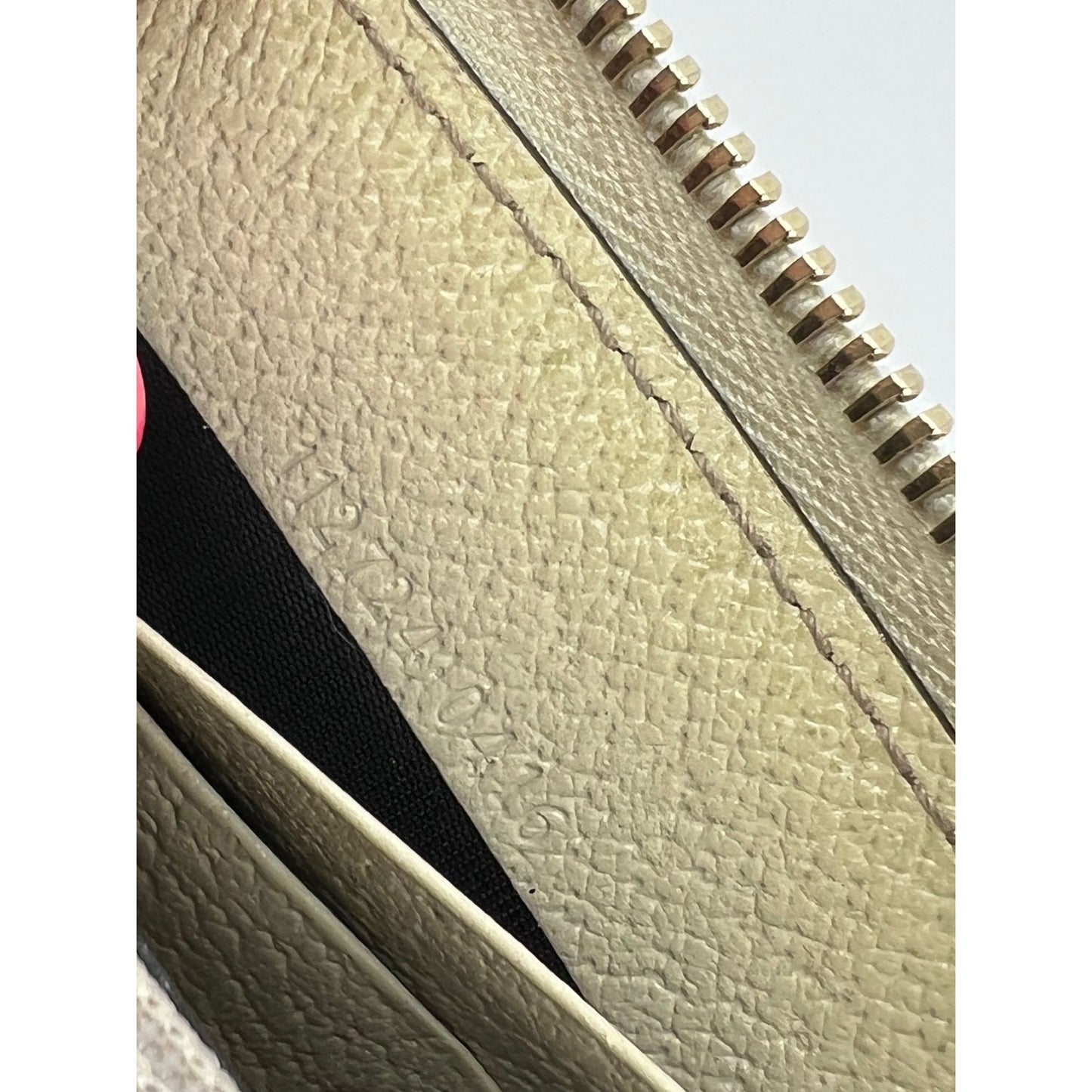 
                  
                    Gucci GG Logo Beige Zip Around Canvas Wallet
                  
                