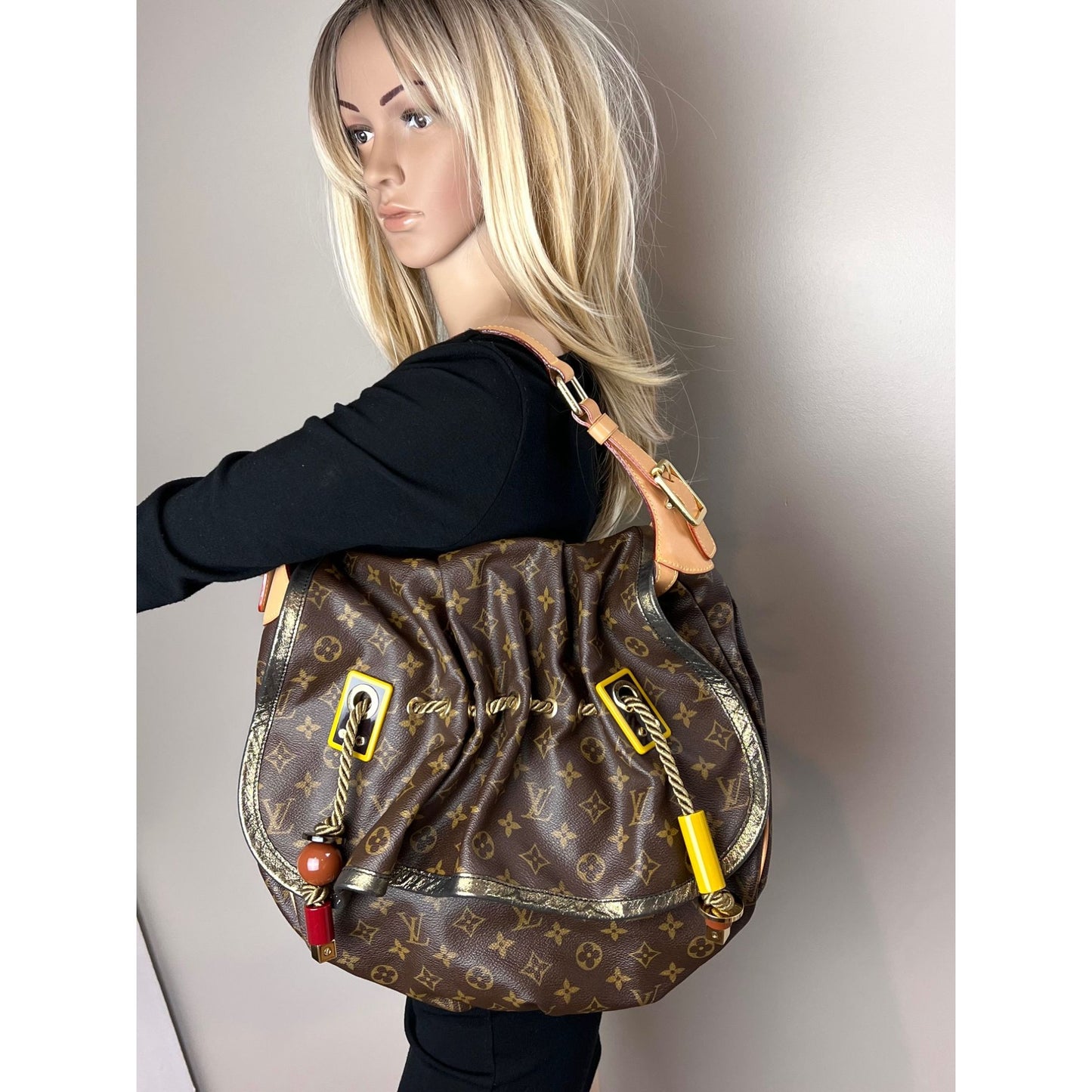 
                  
                    Louis Vuitton Monogram Kalahari GM Shoulder Bag
                  
                