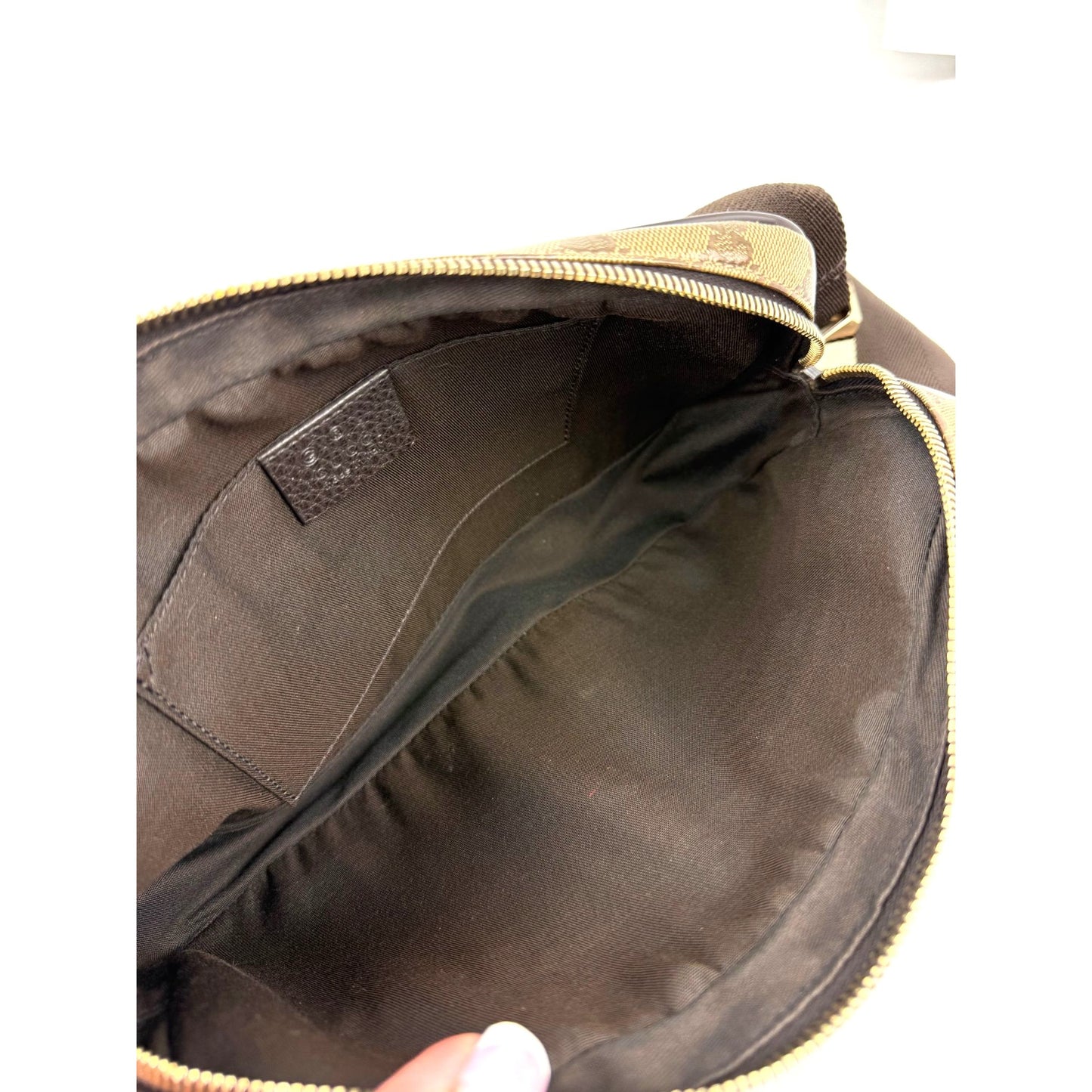 
                  
                    Gucci Crystal Coated GG Canvas Monogram Belt Sling Bag
                  
                