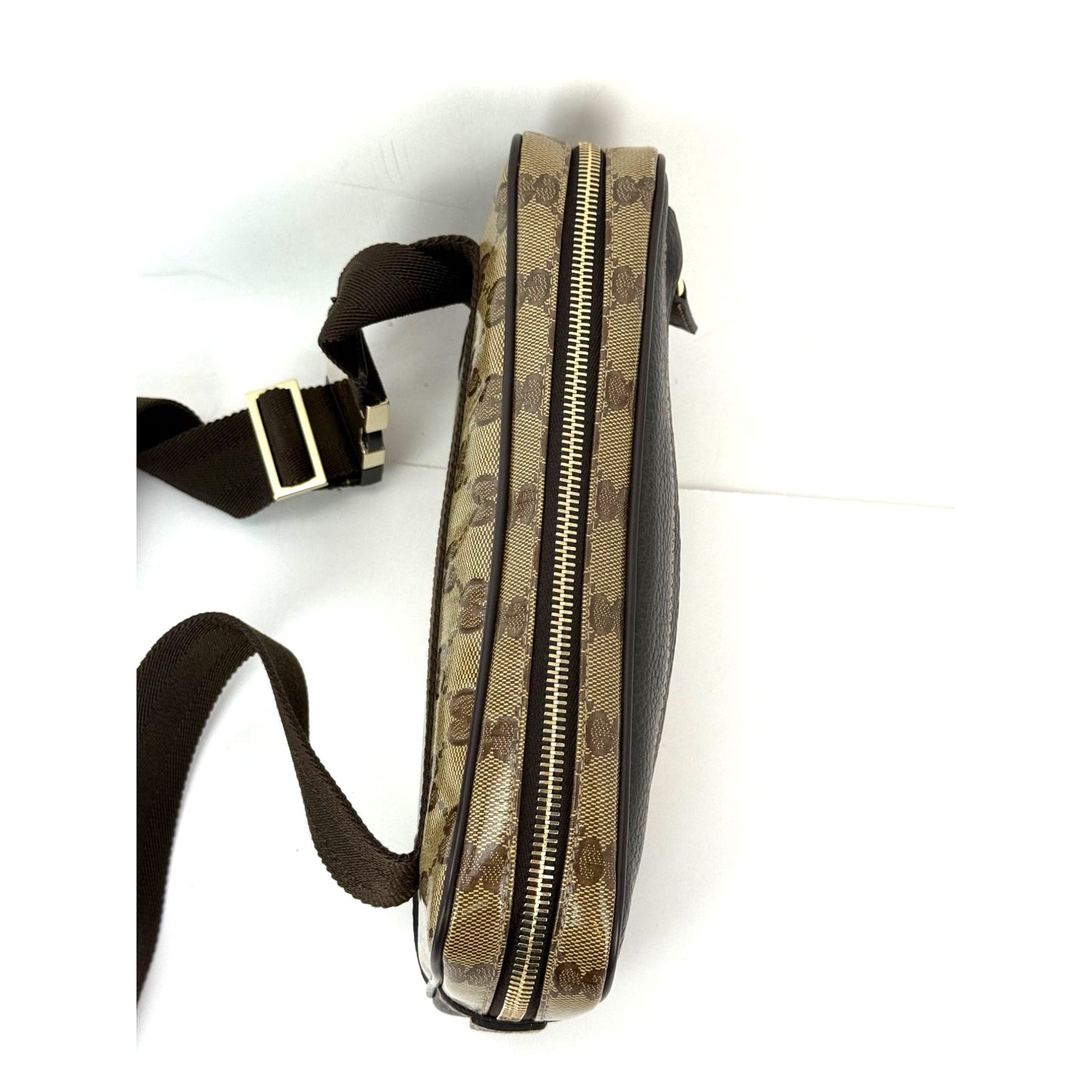 
                  
                    Gucci Crystal Coated GG Canvas Monogram Belt Sling Bag
                  
                
