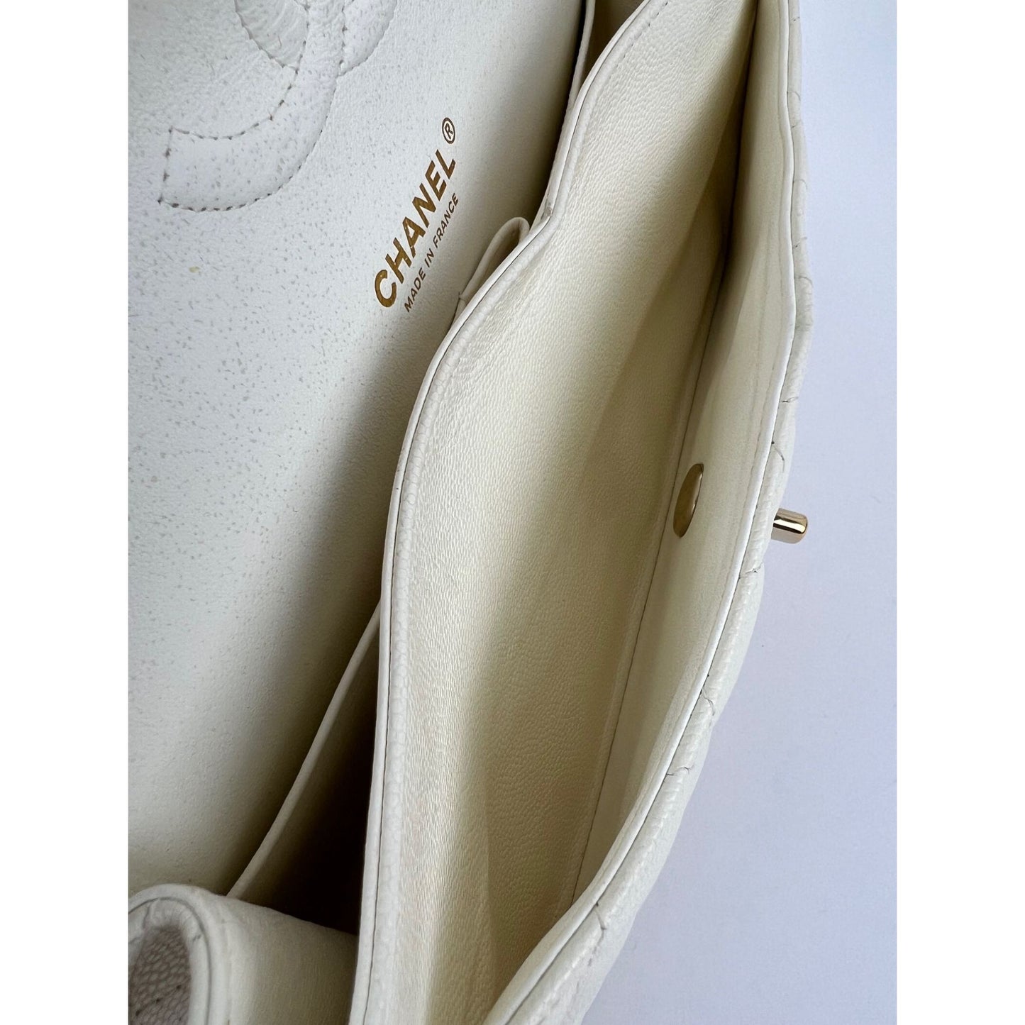 
                  
                    Chanel Caviar Quilted Medium Double Flap White Shoulder Bag
                  
                