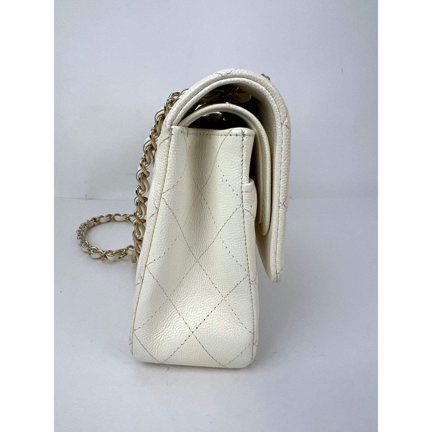 
                  
                    Chanel Caviar Quilted Medium Double Flap White Shoulder Bag
                  
                