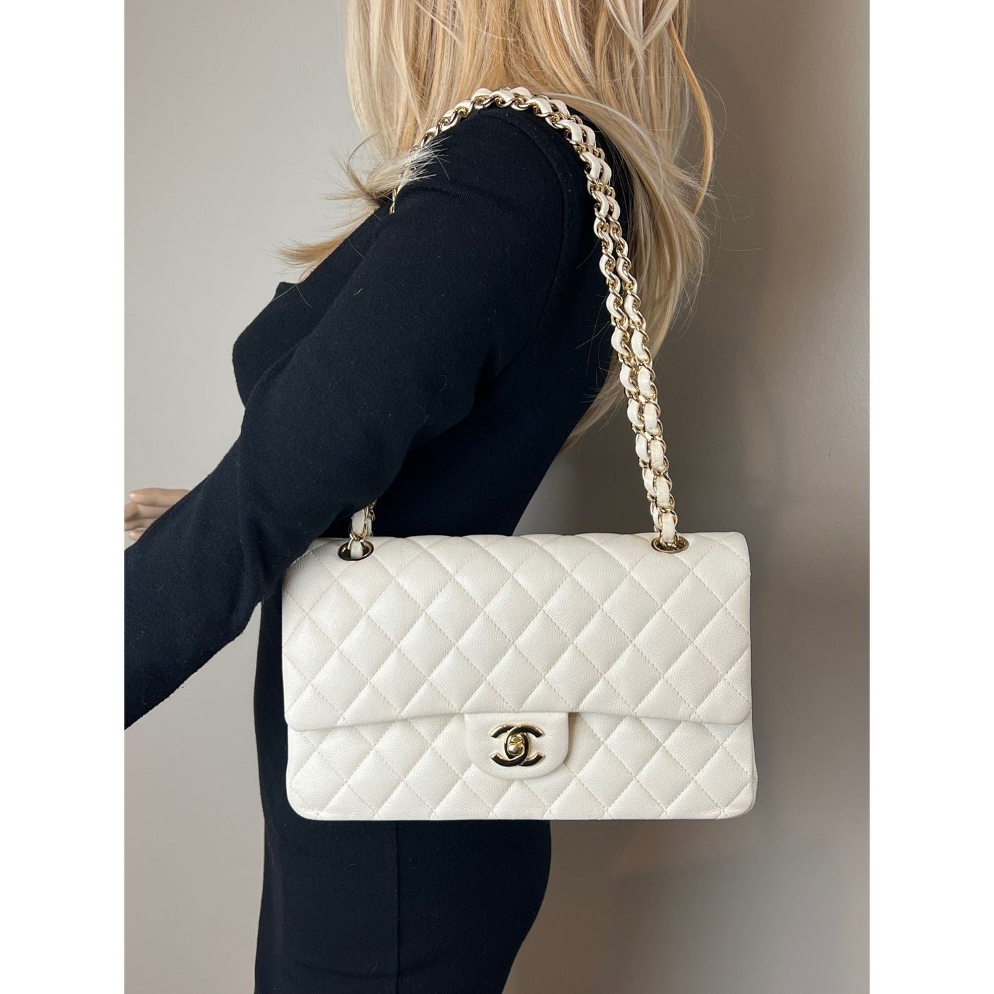 
                  
                    Chanel Caviar Quilted Medium Double Flap White Shoulder Bag
                  
                