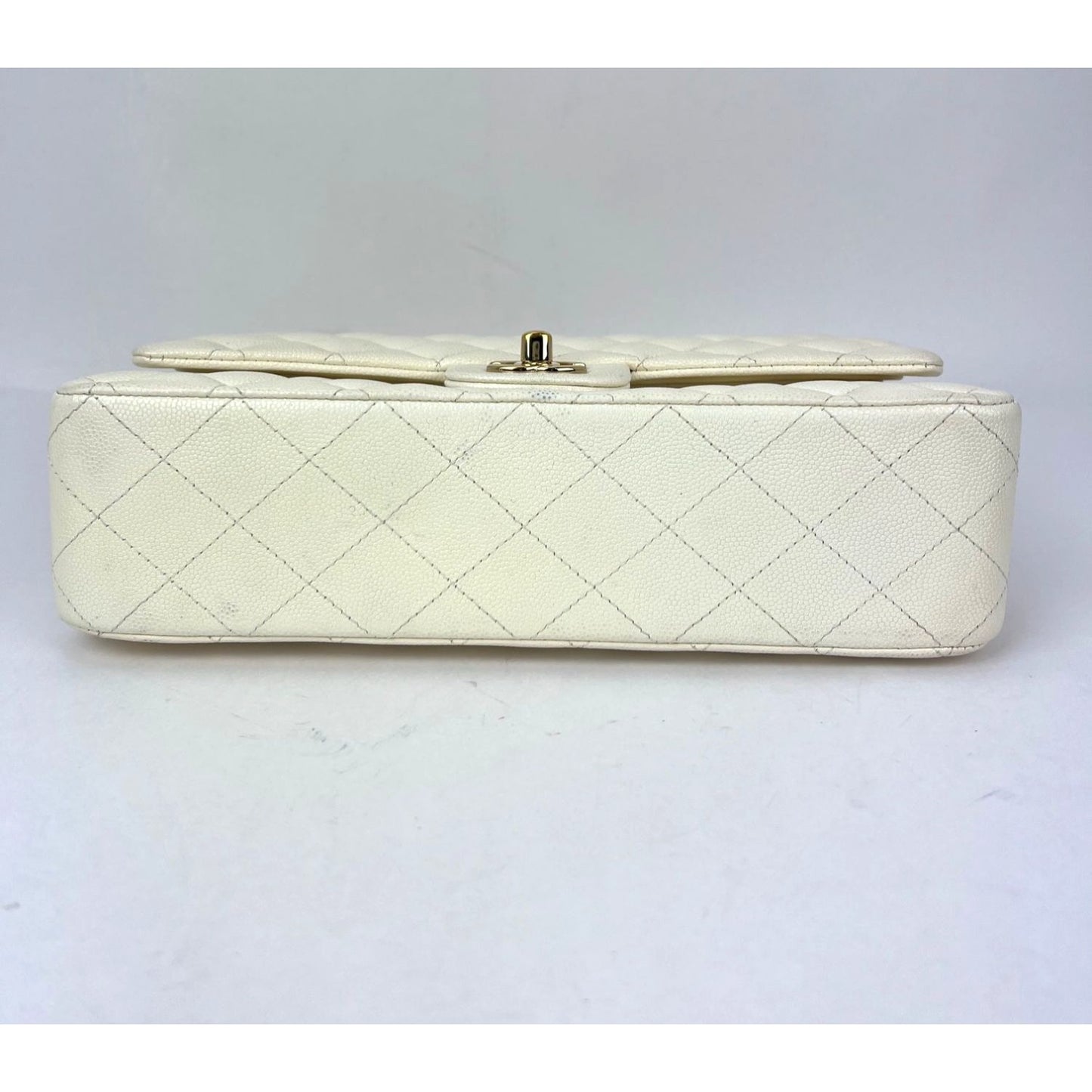 
                  
                    Chanel Caviar Quilted Medium Double Flap White Shoulder Bag
                  
                