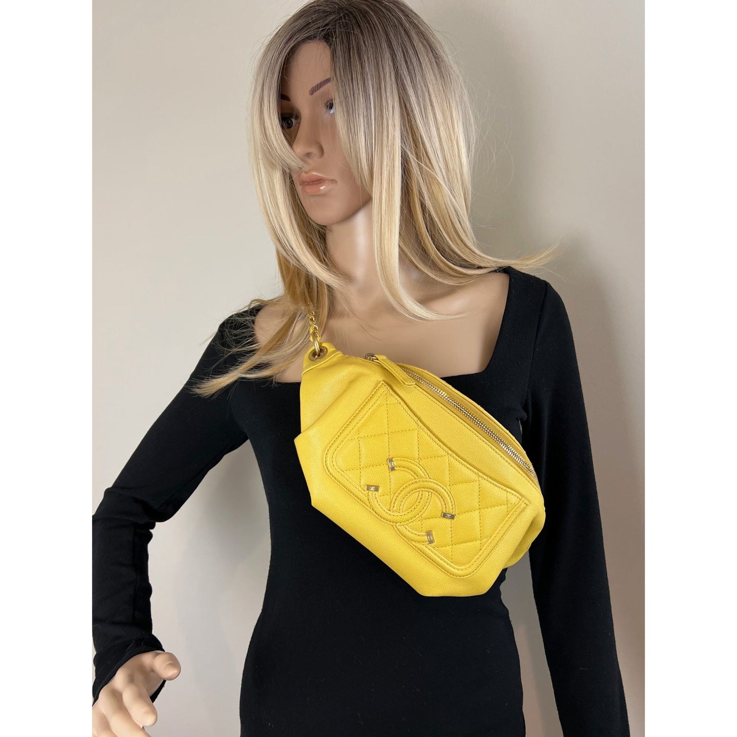
                  
                    Chanel Caviar Quilted Filigree Yellow Waist Bag
                  
                