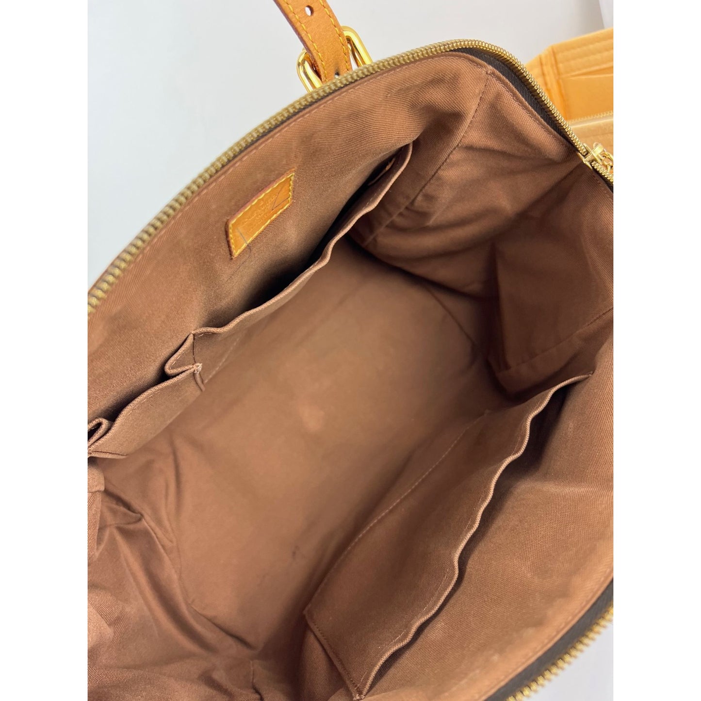 
                  
                    Louis Vuitton Tivoli GM Monogram Shoulder Bag
                  
                