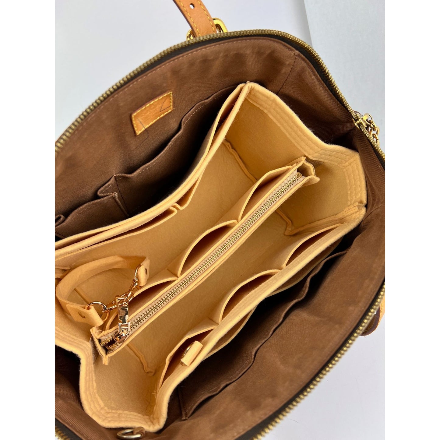 
                  
                    Louis Vuitton Tivoli GM Monogram Shoulder Bag
                  
                