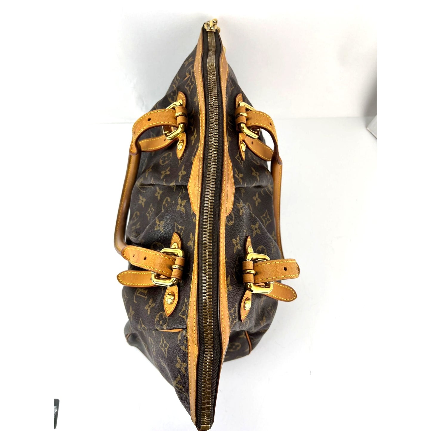 
                  
                    Louis Vuitton Tivoli GM Monogram Shoulder Bag
                  
                