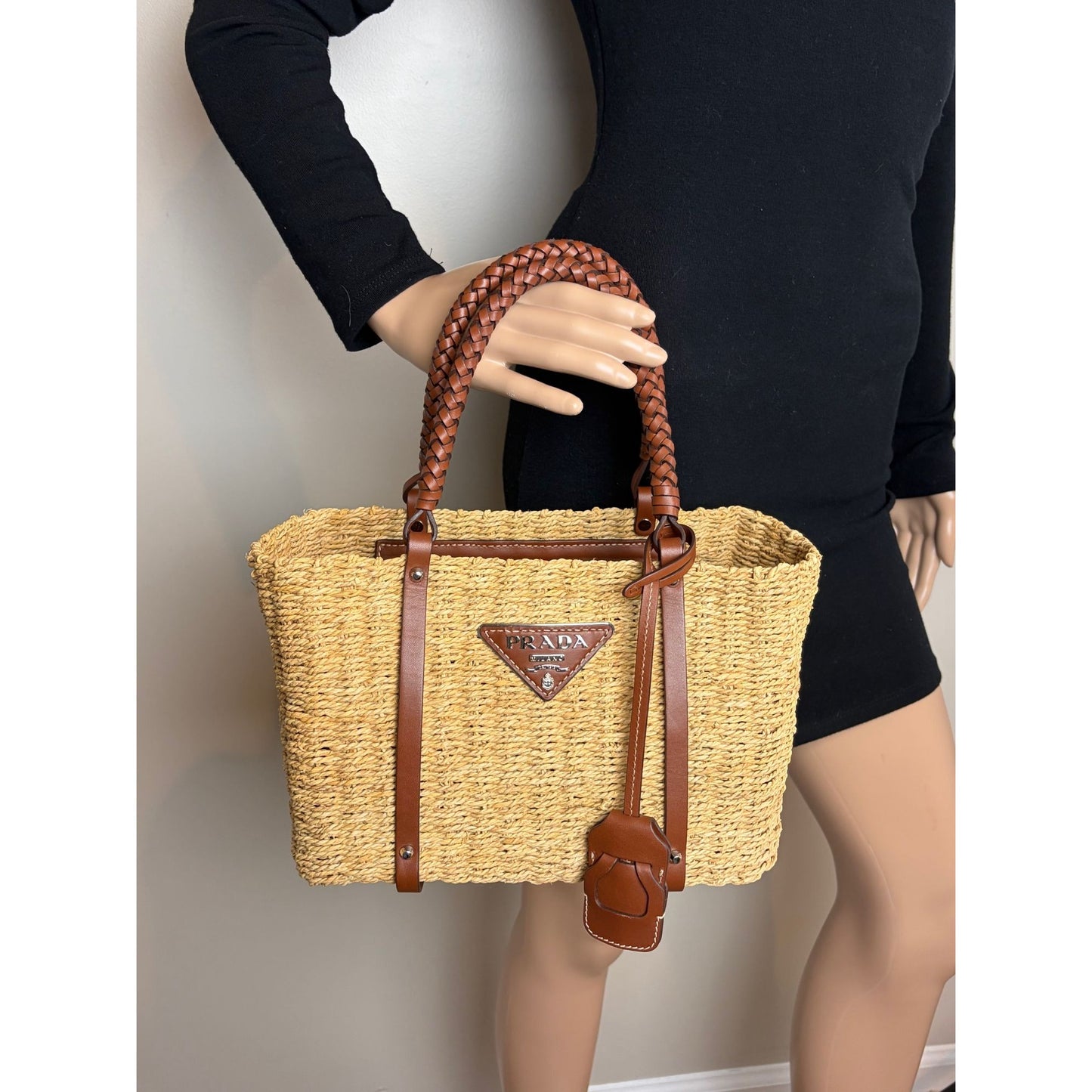 
                  
                    Prada Palmetto Vitello Woven Raffia Naturale Tote Bag
                  
                