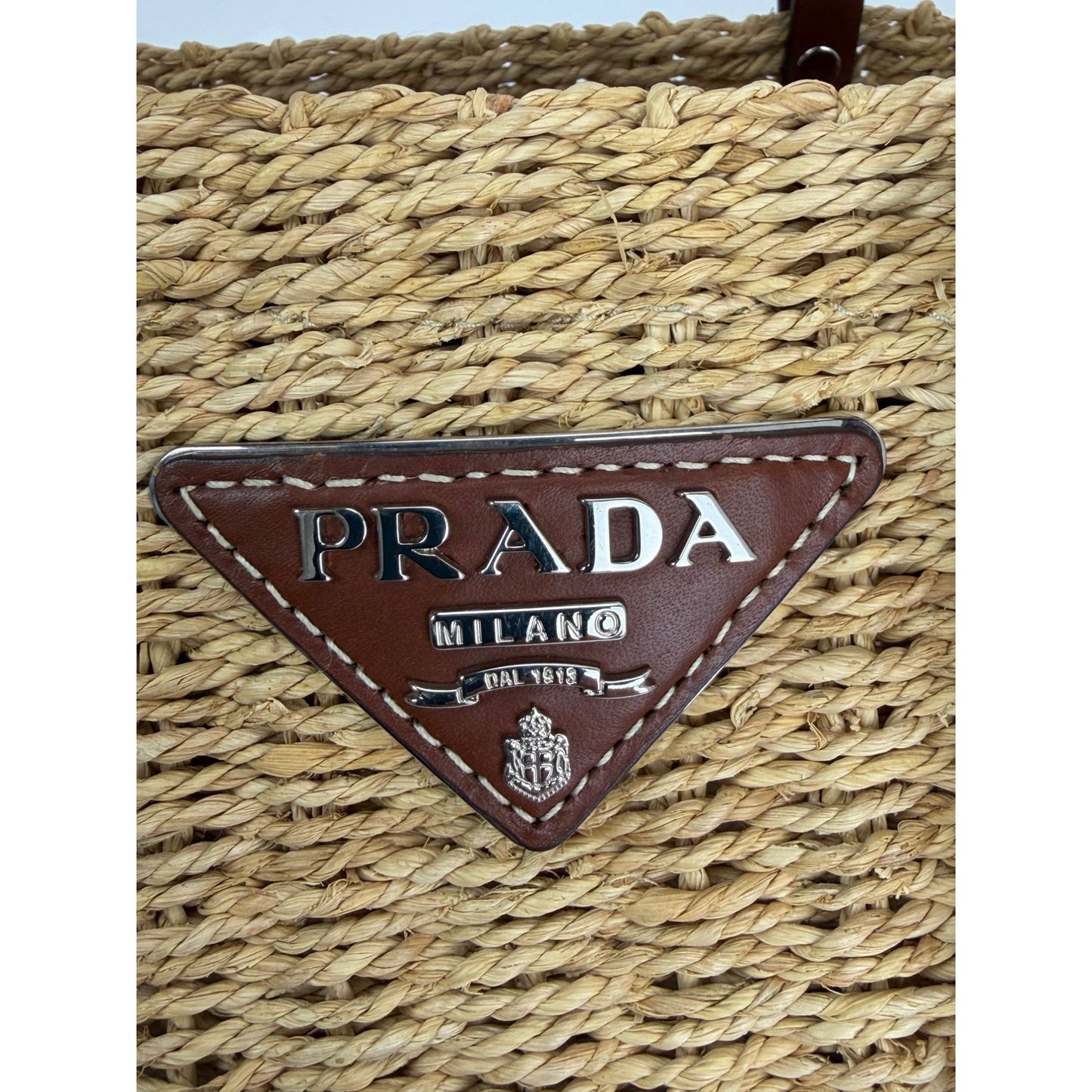 
                  
                    Prada Palmetto Vitello Woven Raffia Naturale Tote Bag
                  
                