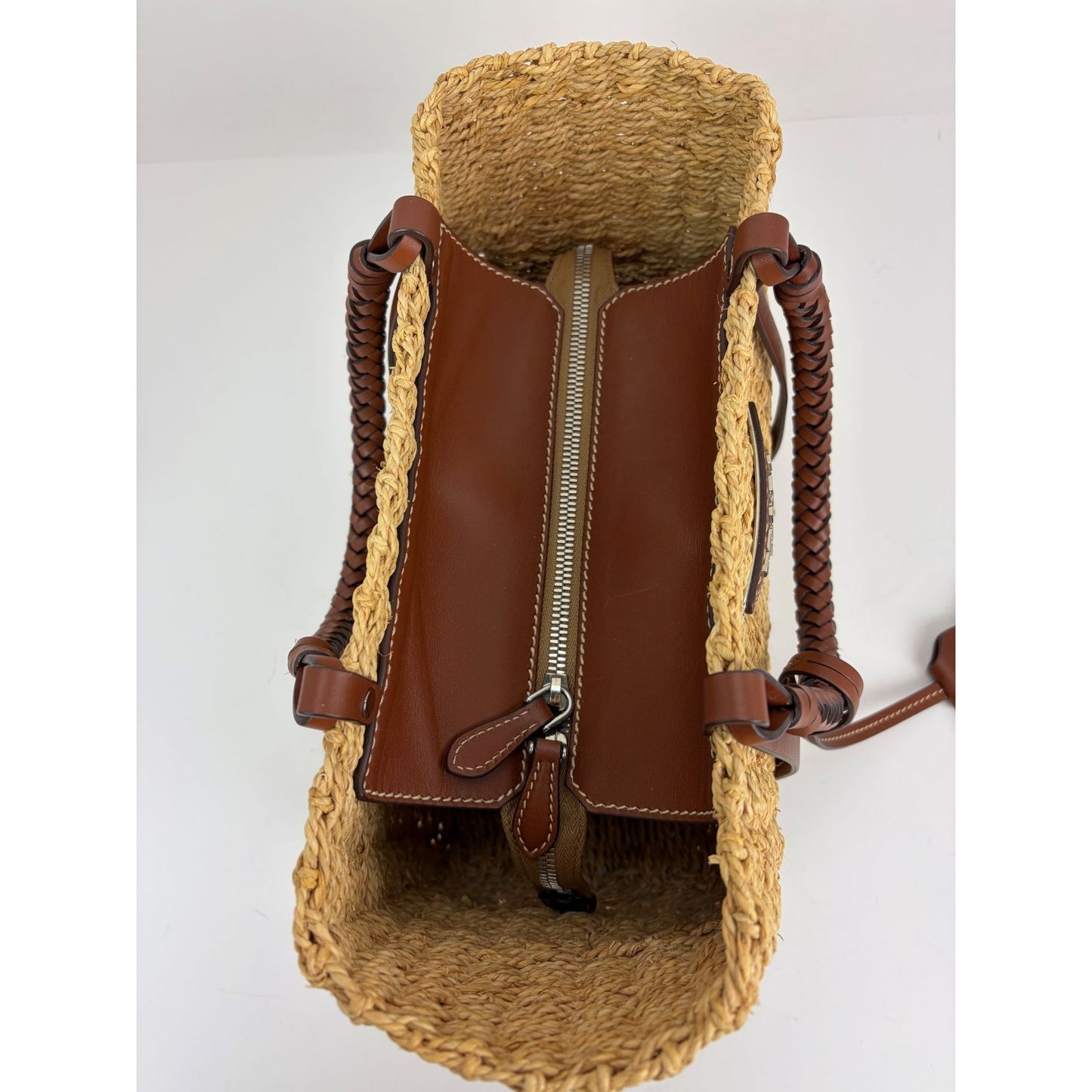
                  
                    Prada Palmetto Vitello Woven Raffia Naturale Tote Bag
                  
                