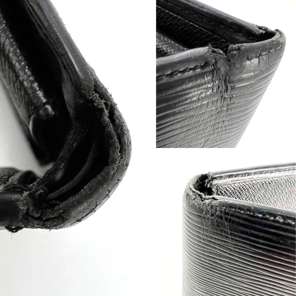 
                  
                    Louis Vuitton Vintage Black Epi Leather Multiple Men's Wallet
                  
                