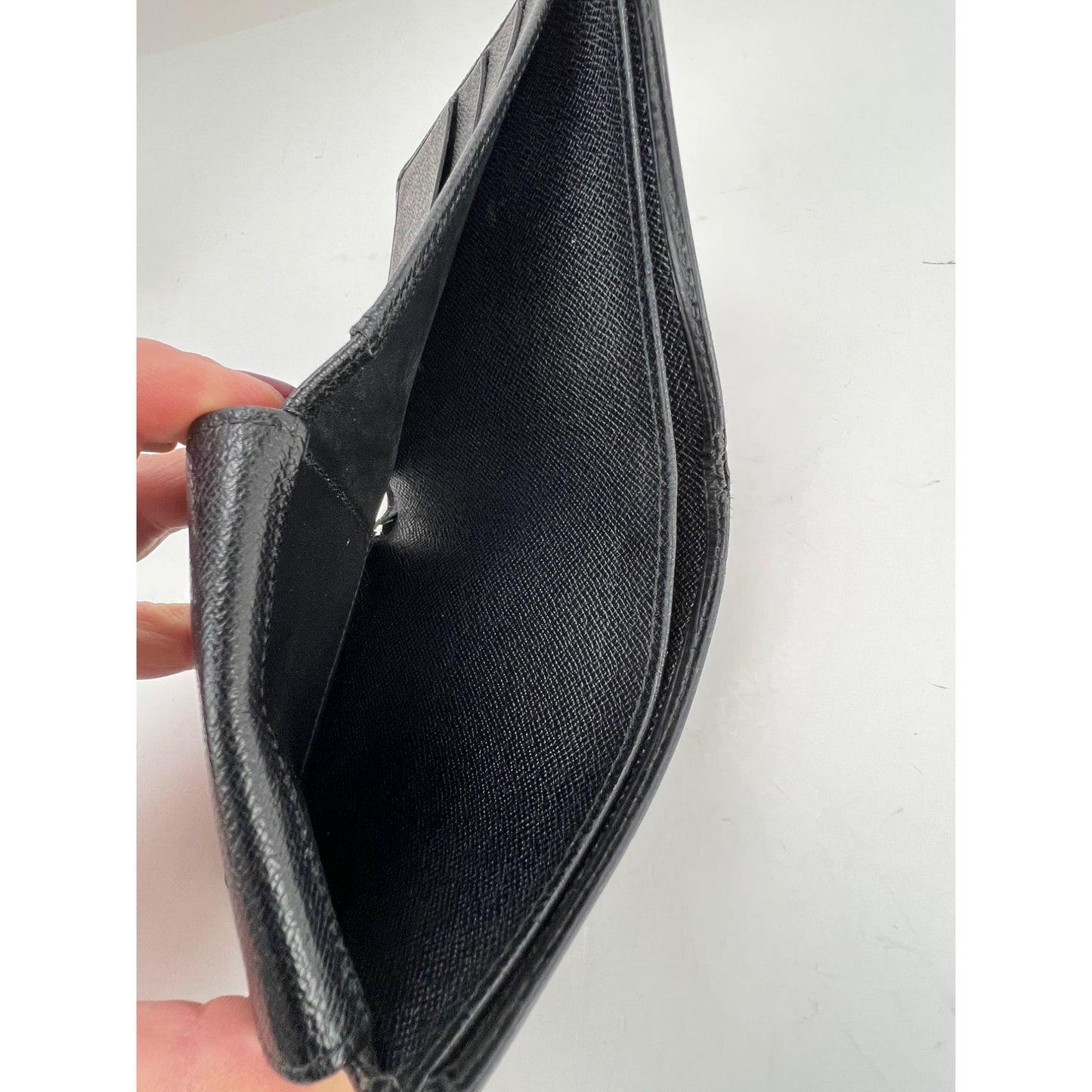 
                  
                    Louis Vuitton Vintage Black Epi Leather Multiple Men's Wallet
                  
                