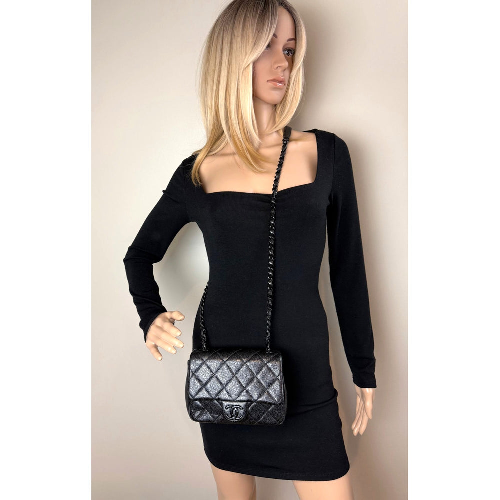 
                  
                    Chanel Caviar Quilted Incocognito Mini Square Black Flap Bag
                  
                
