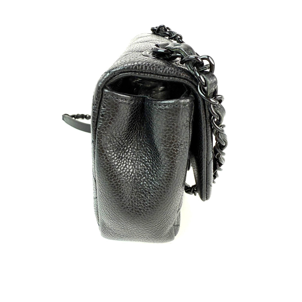 
                  
                    Chanel Caviar Quilted Incocognito Mini Square Black Flap Bag
                  
                