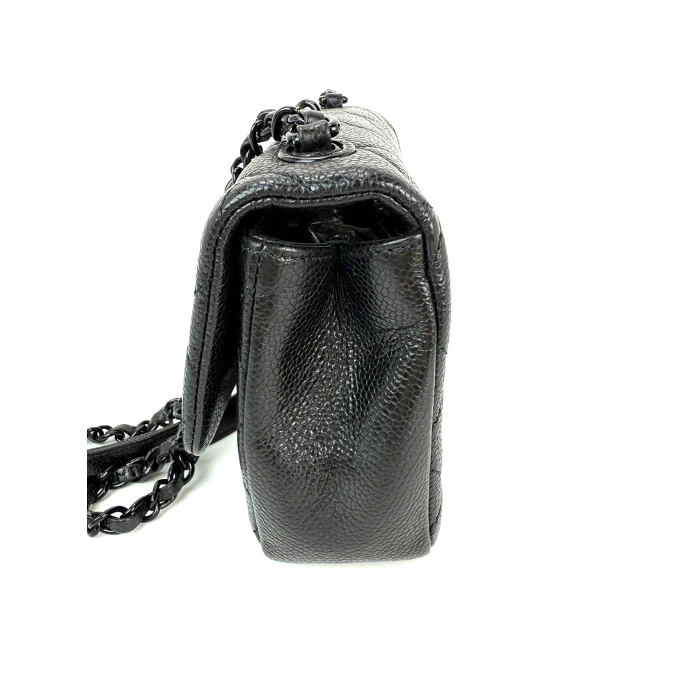 
                  
                    Chanel Caviar Quilted Incocognito Mini Square Black Flap Bag
                  
                