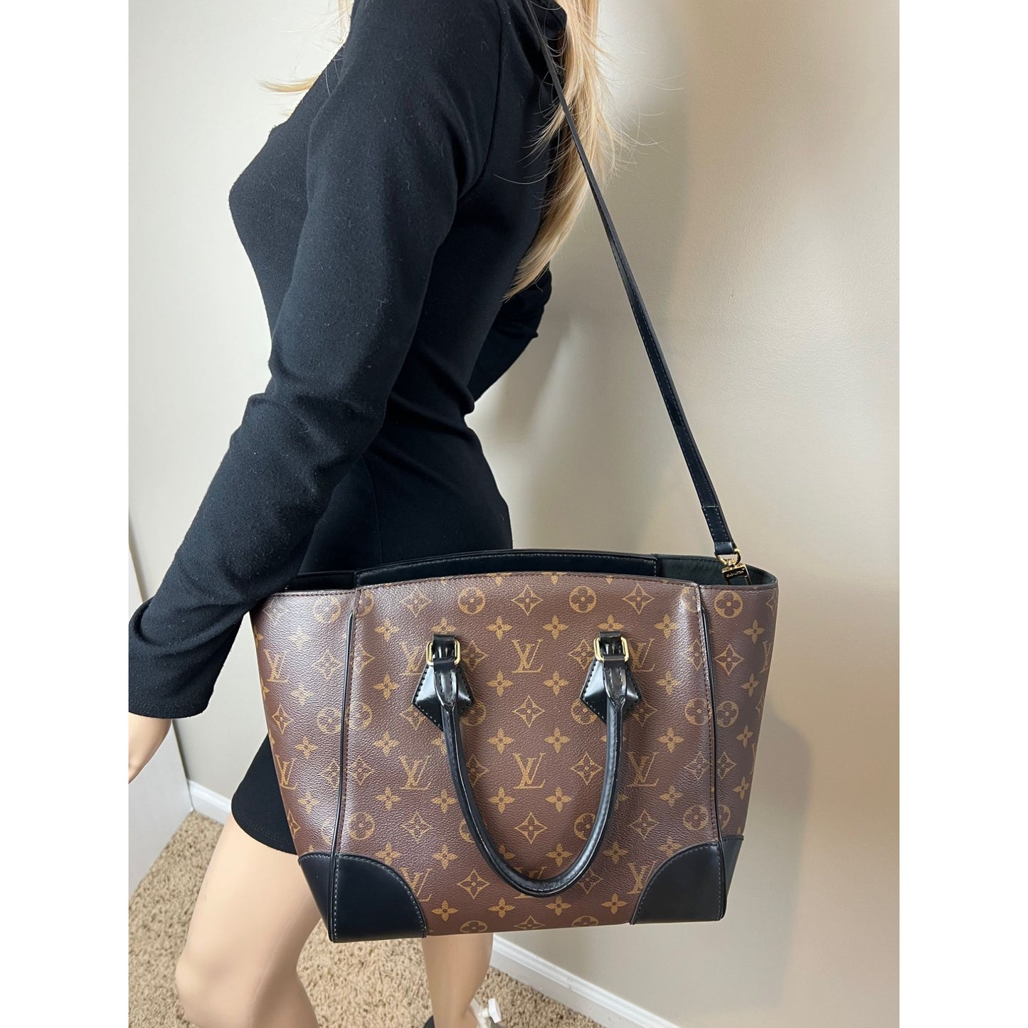 
                  
                    Louis Vuitton Phenix Monogram Leather Tote Bag
                  
                