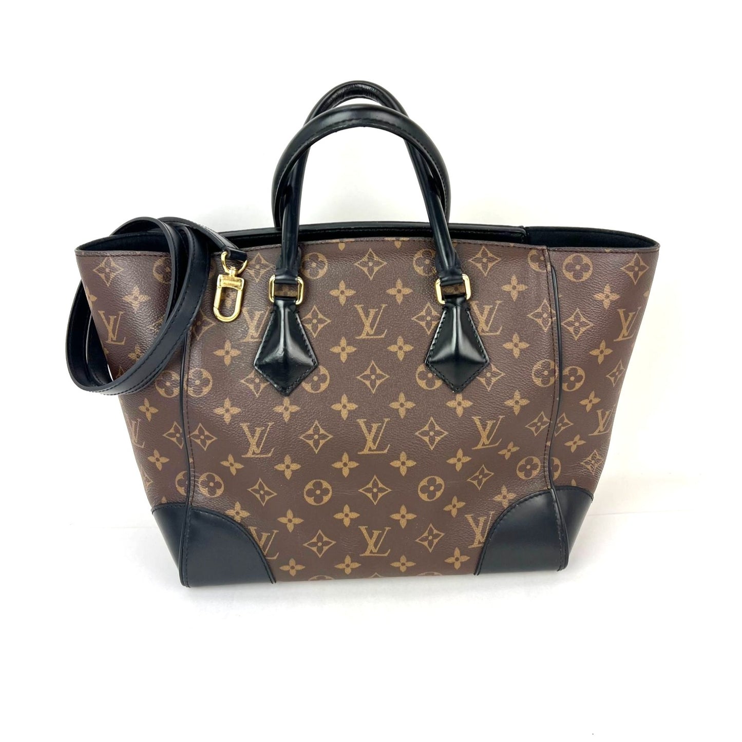 
                  
                    Louis Vuitton Phenix Monogram Leather Tote Bag
                  
                
